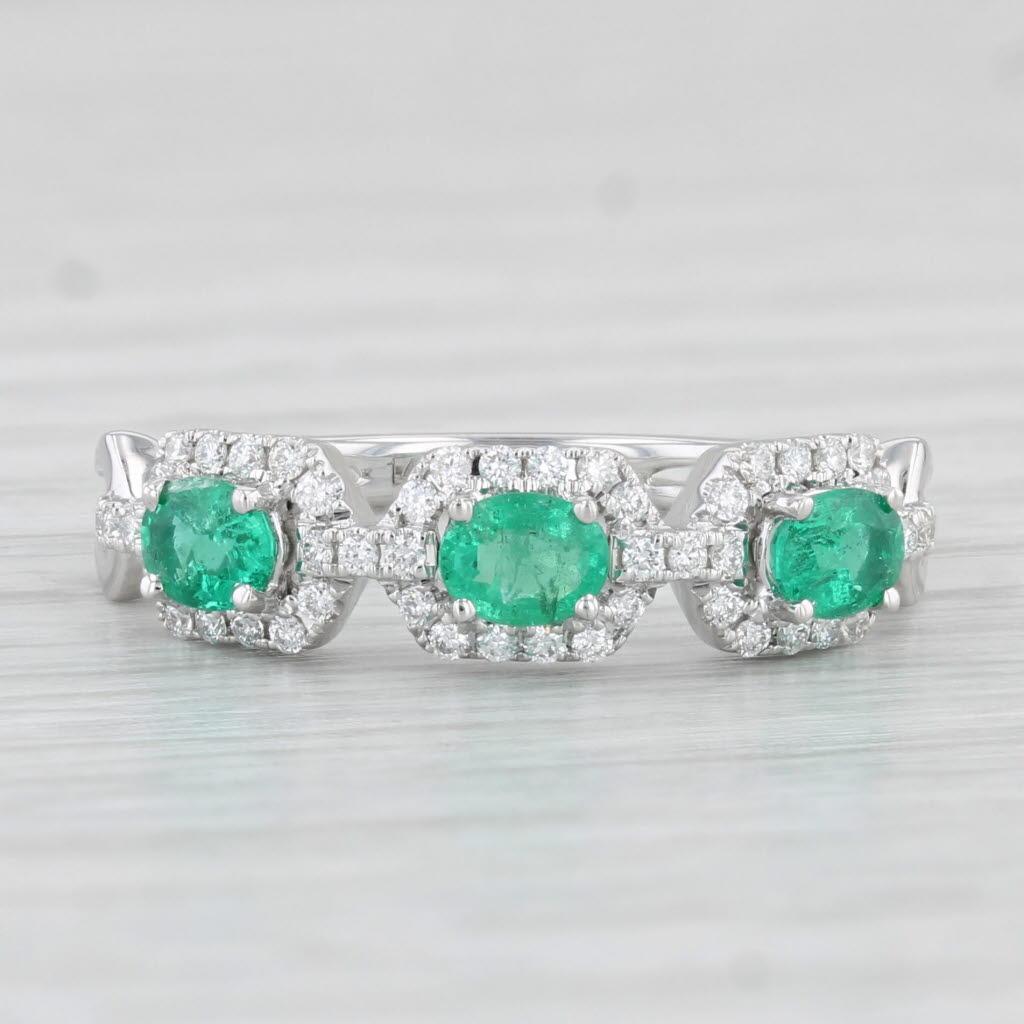 Gemstone Information:
- Natural Emeralds -
Total Carats - 0.51ctw
Cut - Oval
Color - Green
Treatment - Oiling

- Natural Diamonds -
Total Carats - 0.20ctw
Cut - Round Brilliant
Color - F - G
Clarity - VS2 - SI1

Metal: 14k White Gold 
Weight: 2.5