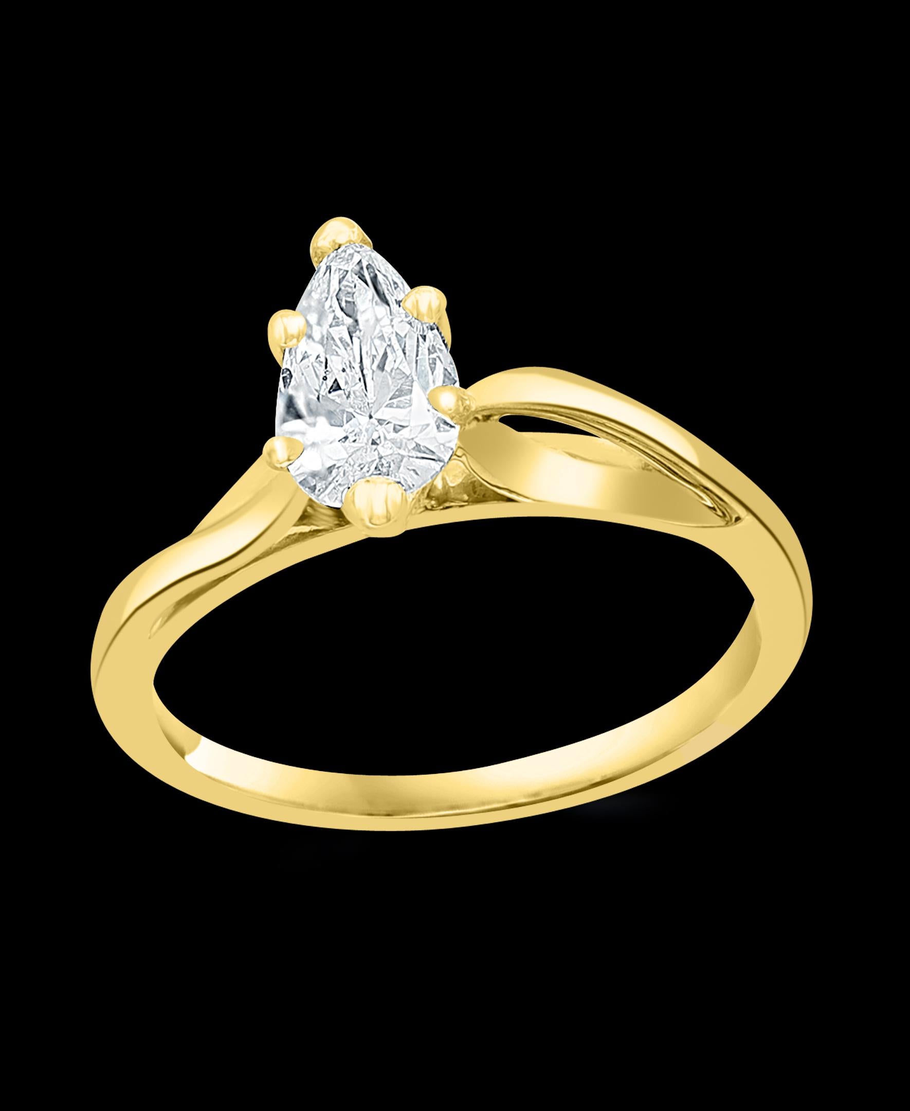 A sweet, shimmery style for any day of the week. This engagement ring has a very clean diamond 0.72 pointer
 Solitaire Pear cut diamonds. 
Set in 14 kt Yellow  gold. 2.2 gm
Best For Every day , home and work 
6 prong setting 
Ring size 5.5

Diamonds