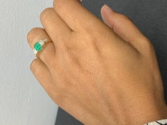 0.72 Carat Emerald Cut Emerald and Diamond 5 Stone Ring in 14K White Gold