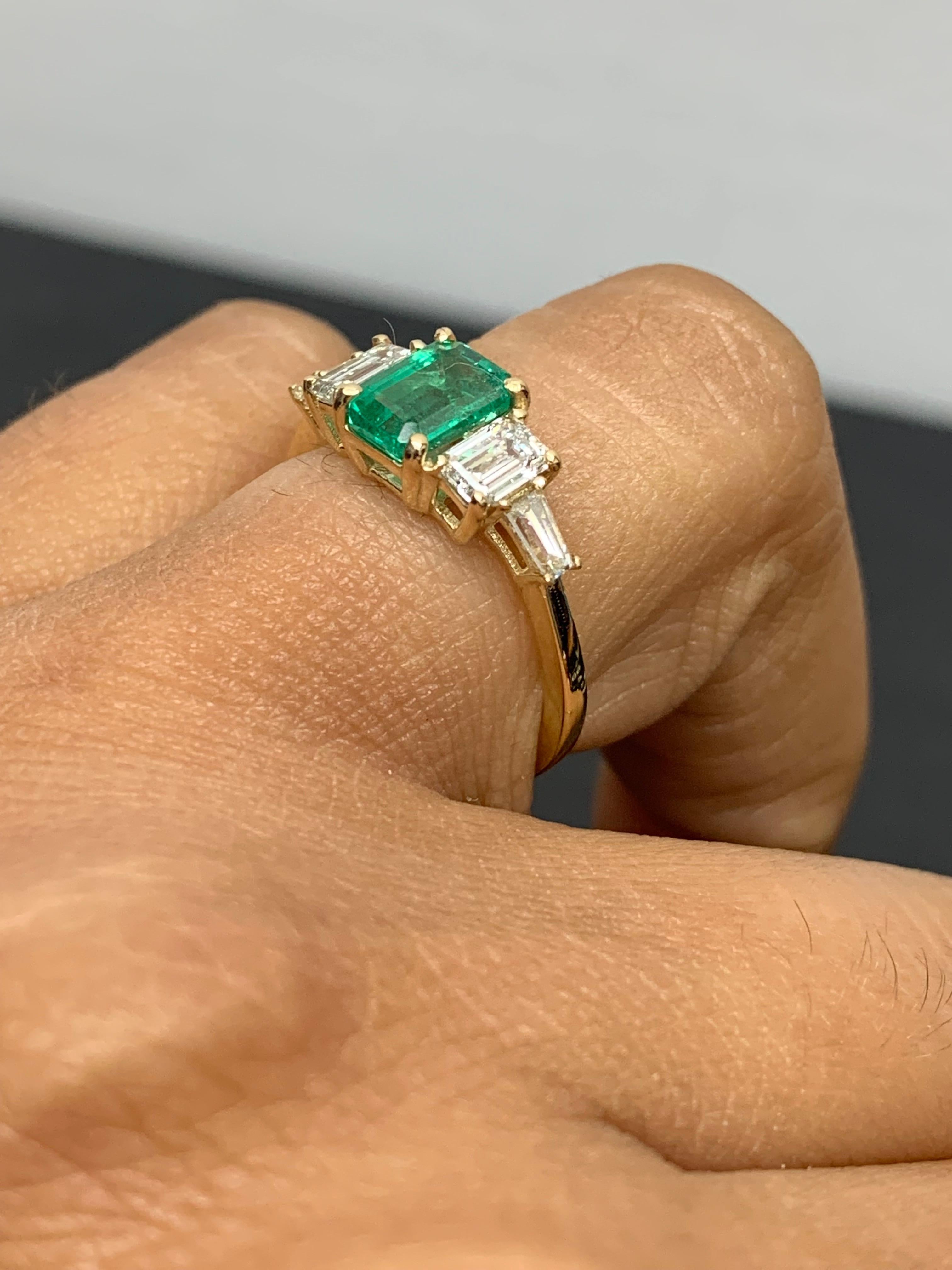 0.72 Carat Emerald Cut Emerald and Diamond 5 Stone Ring in 14K Yellow Gold In New Condition For Sale In NEW YORK, NY