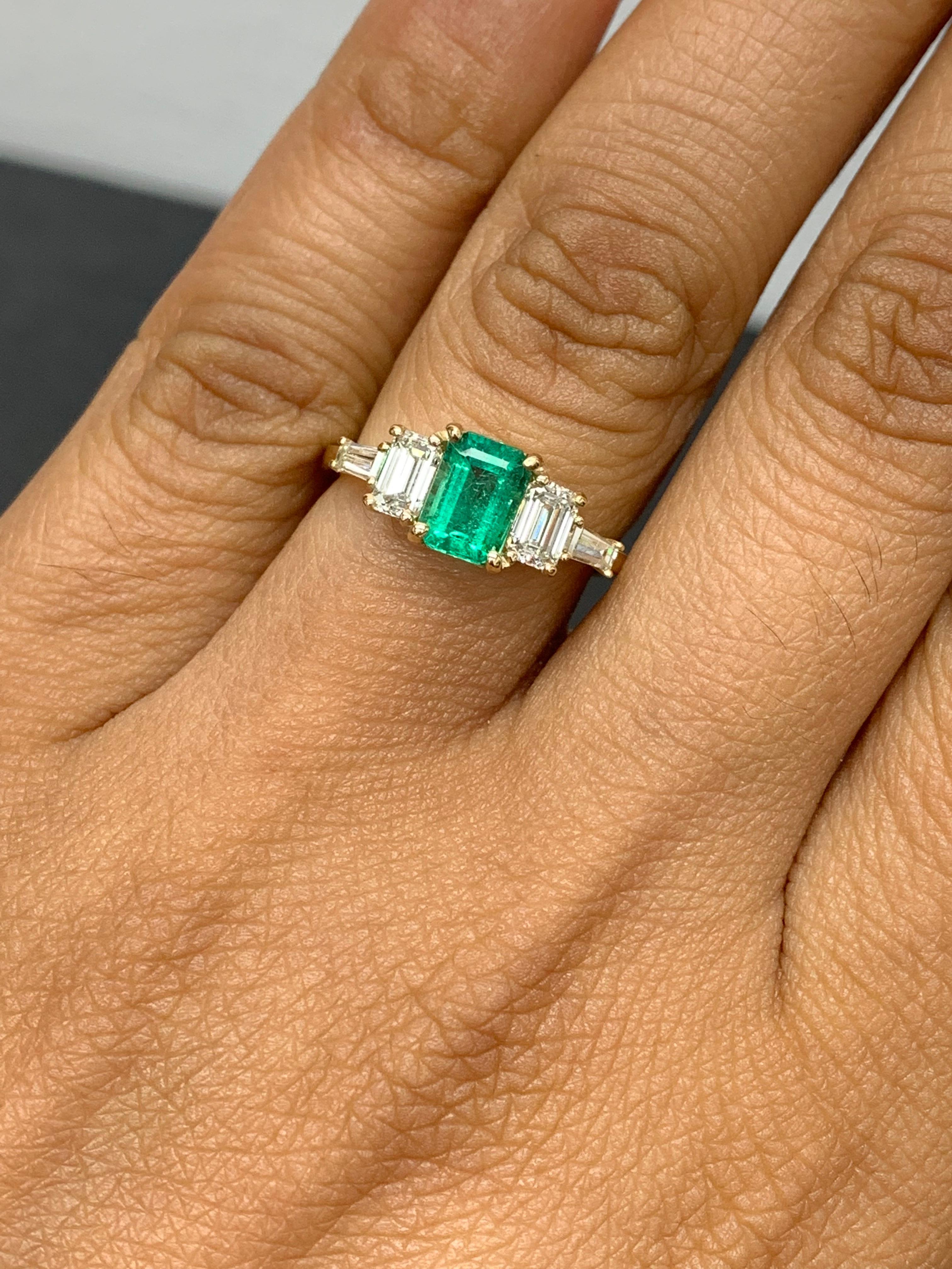 0.72 Carat Emerald Cut Emerald and Diamond 5 Stone Ring in 14K Yellow Gold For Sale 1