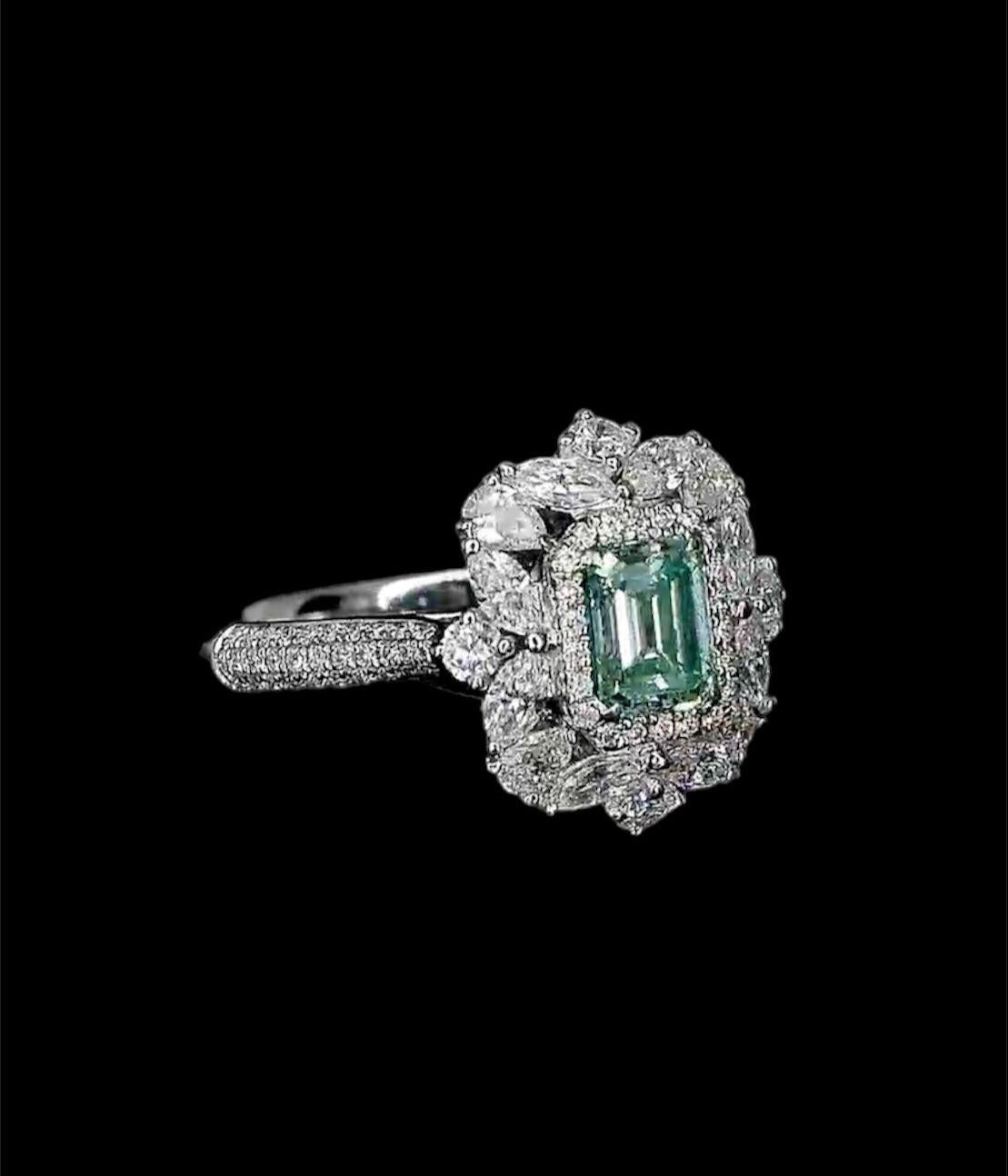 Emerald Cut 0.72 Carat Faint Yellow Green Diamond Ring SI1 Clarity GIA Certified For Sale
