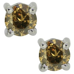 0.72 Carat Fancy Orange Yellow Diamond Stud Earrings