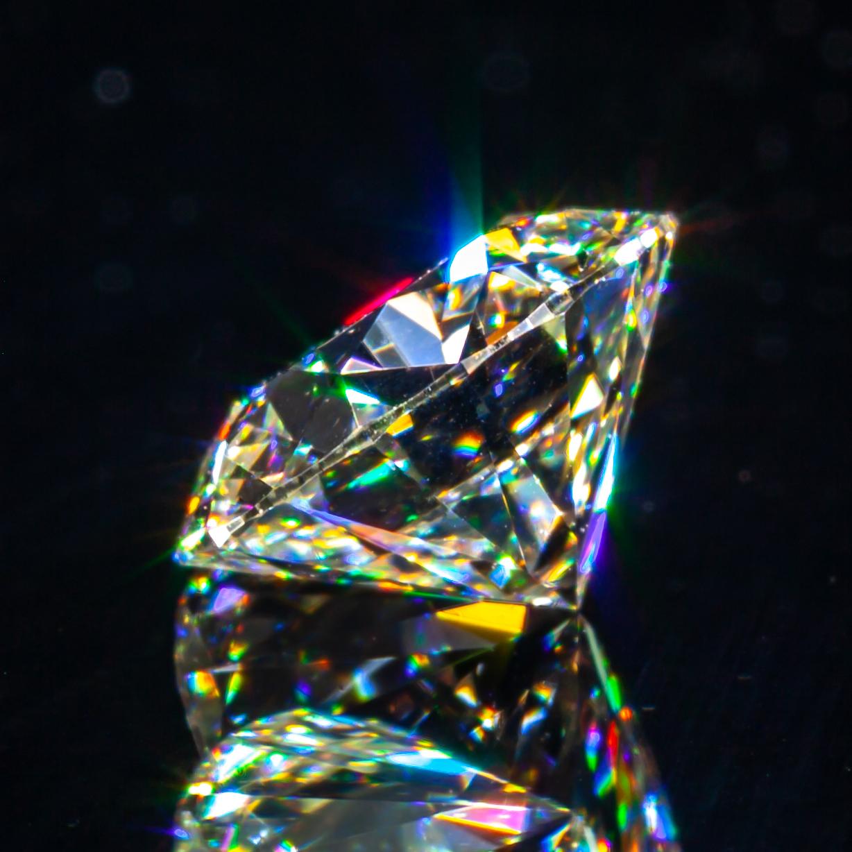 Diamant taille ronde brillant de 0,72 carat non serti J / VVS2 certifié GIA Unisexe en vente
