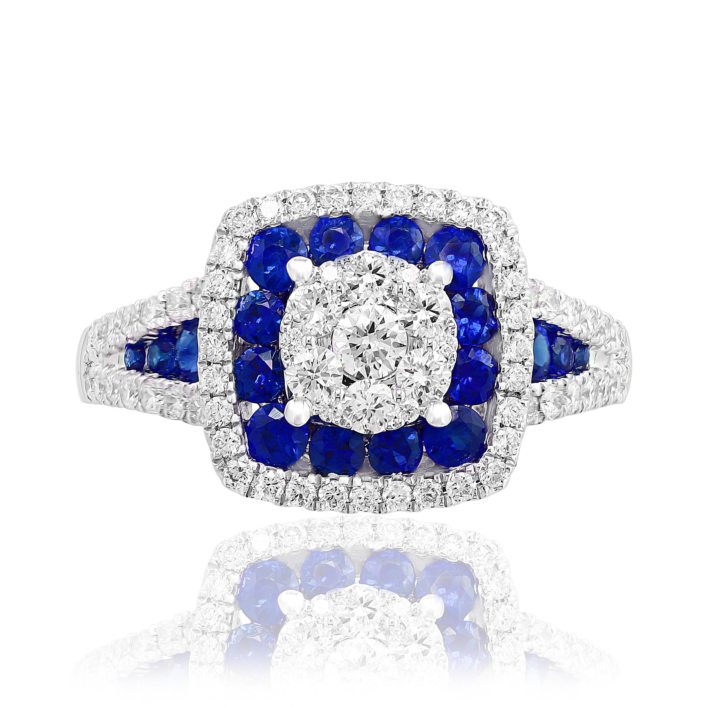 A unique and stylish ring showcasing a cluster of round diamonds in the center surrounded by a row of blue sapphires and another row of diamonds. 18 Blue Sapphires weigh 0.72 carat and 73 diamonds weigh 0.70 carat in total.  Made in 14k white gold.
