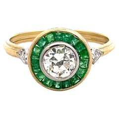 0,72 Karat Diamantring aus 18 Karat Gelbgold mit alteuropäischem Schliff und 0,30 Karat Smaragd