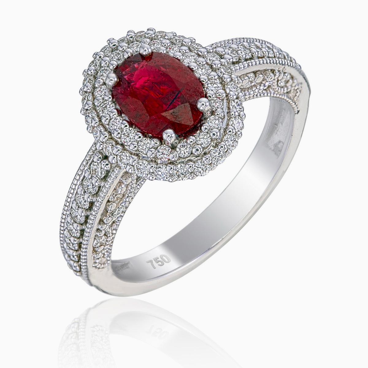 Presenting an exquisite solitaire ring featuring a rare GRS-certified ‘Pigeon Blood’ red ruby, weighing 0.72 carats (GRS2021-111296). This cushion-shaped center stone originates from Burma and is completely natural, untreated to showcase its pure,