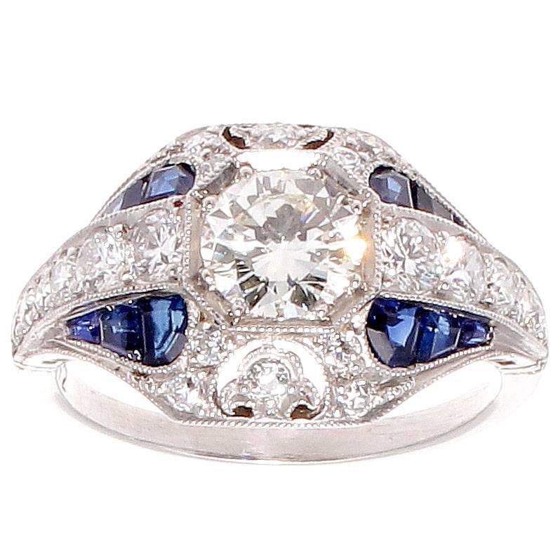 0.72 Carat Round Brilliant Cut Diamond Sapphire Platinum Ring