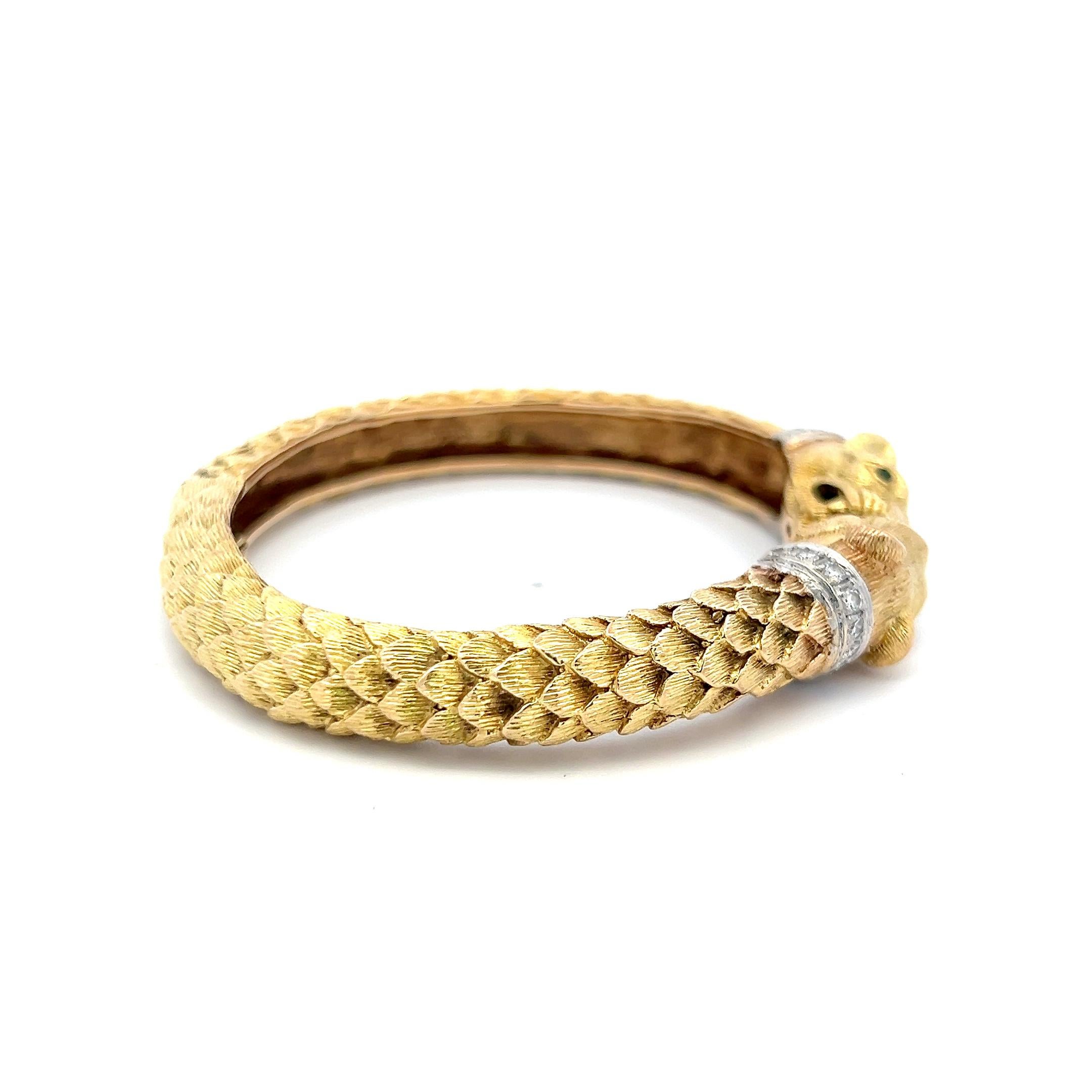 Title:
0.72 Carat Round Brilliant H SI Diamond 0.04 Carat Round Brilliant Emerald 18 Karat Two Tone Gold Bangle Bracelet
Style:
Bangle
Metal:
18 Karat Two Tone Gold
Gemstone 1:
0.72 Carat Diamond
Number of