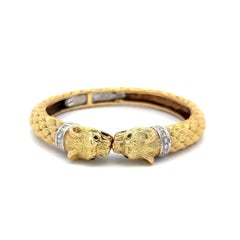 0.72 Carat Round Brilliant Diamond 0.04 Carat Emerald 18K Two Tone Gold Bracelet