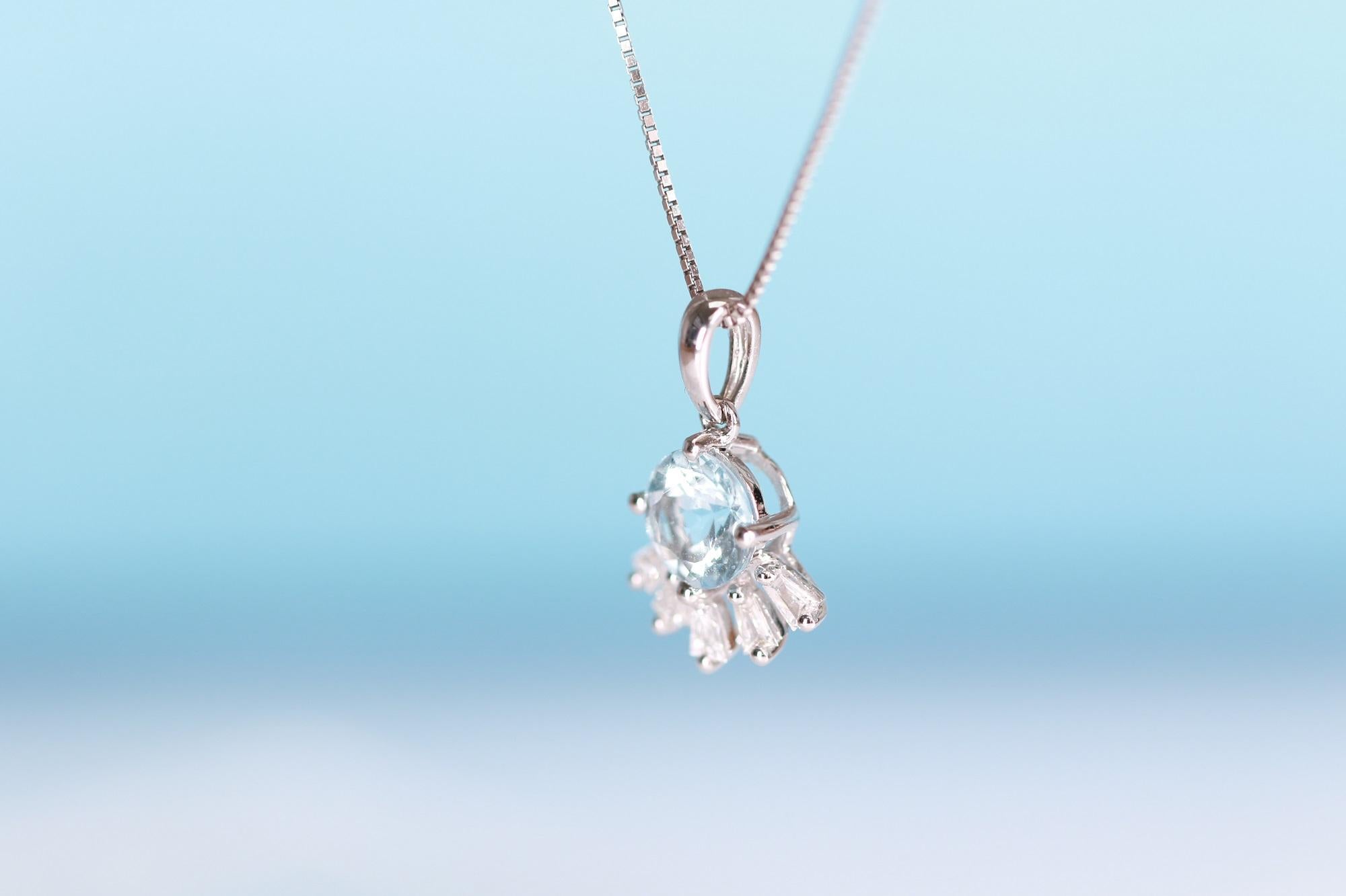 Stunning, timeless and classy eternity Unique Pendant. Decorate yourself in luxury with this Gin & Grace Pendant. The 18k White Gold jewelry boasts Round Cut Prong Setting Genuine Aquamarine (1 pcs) 0.72 Carat, along with Natural Baguette cut white
