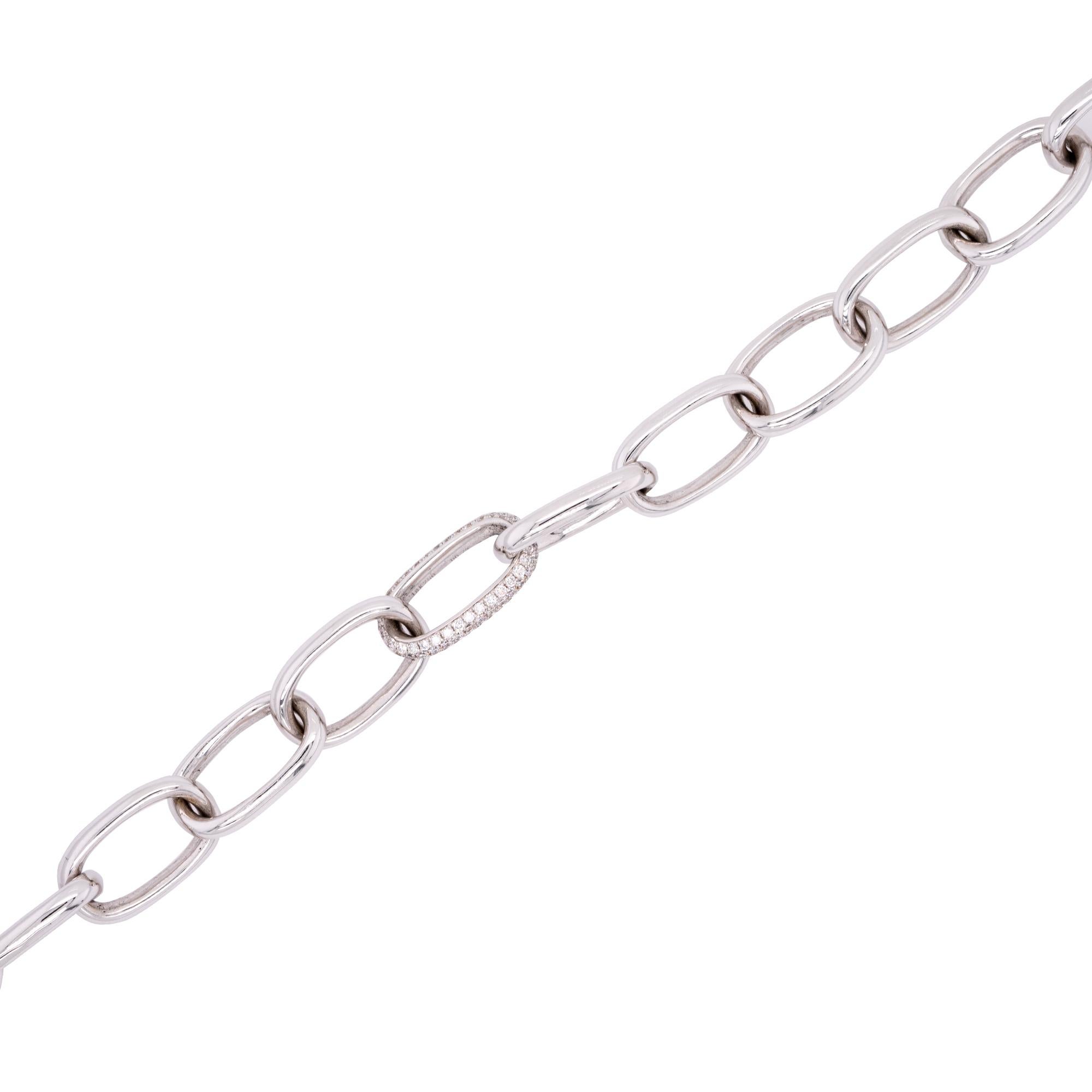 This 14k white gold link bracelet features 0.72 carats of round cut natural diamonds with a G/H color and VS clarity. The bracelet measures 7 inches in length and has a total weight of 26.5 grams (17 dwt). The pave design of the diamonds adds a