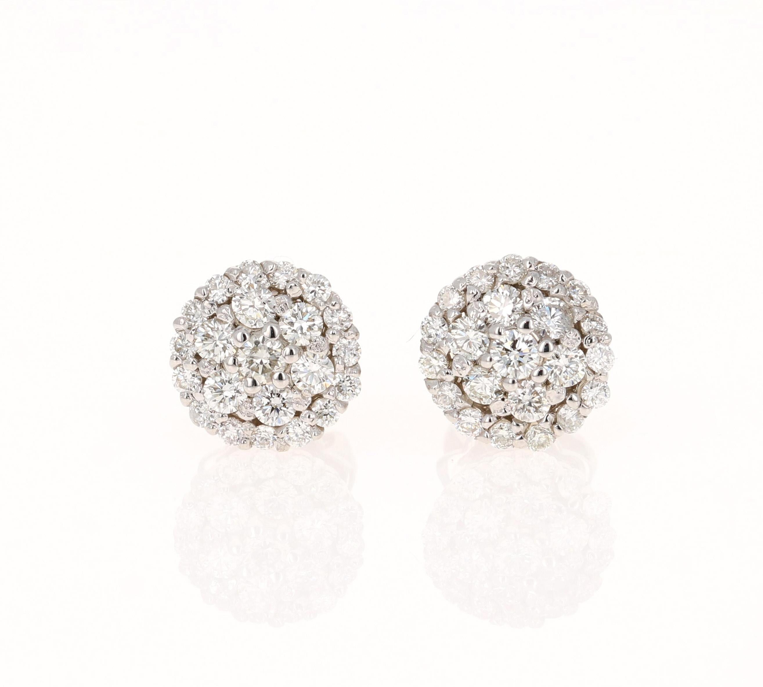 These earrings have 44 Round Cut Diamonds that weigh 0.72 carats. The clarity is VS and color is H. The width of the earrings are approximately 8.5 mm

The backing of the earring is a standard push back. The Earrings are made in 14K White Gold and