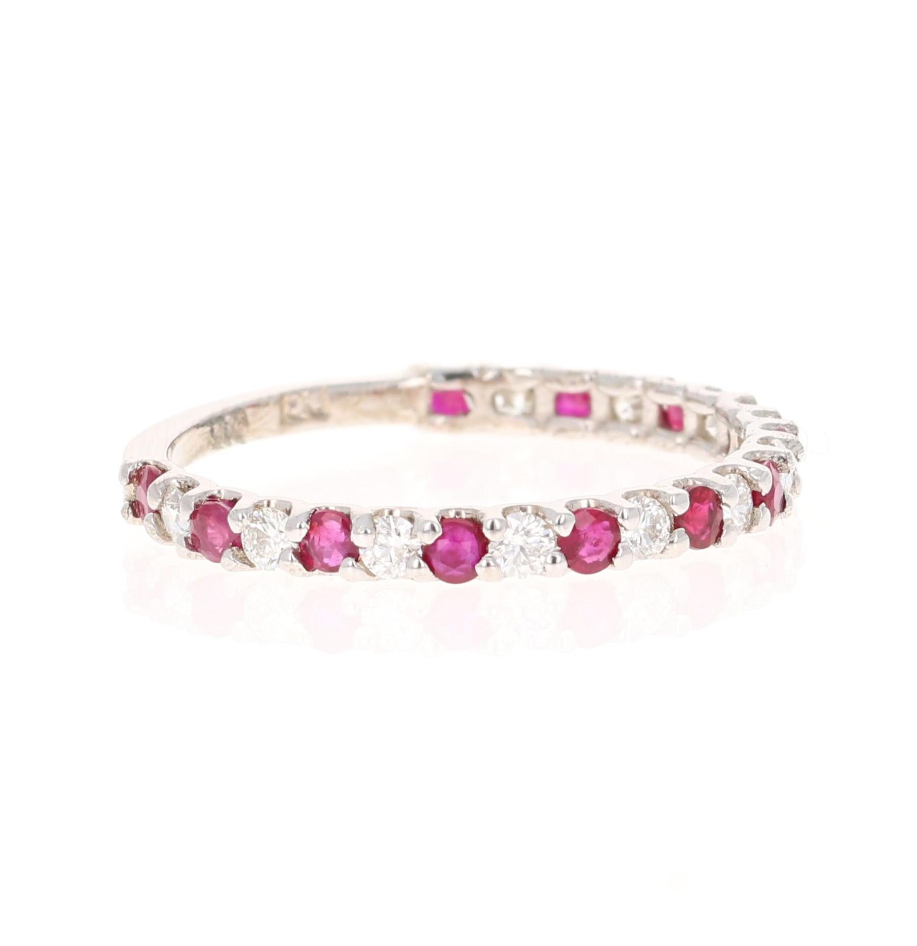 It has 12 Rubies that weigh 0.45 Carats and 11 Round Cut Diamonds that weigh 0.27 Carats. (Clarity: SI, Color: F) The Total Carat Weight of the Band is 0.72 Carats
It is made in 14K White Gold and weighs 1.2 Grams.
It’s a size 7 and can be resized
