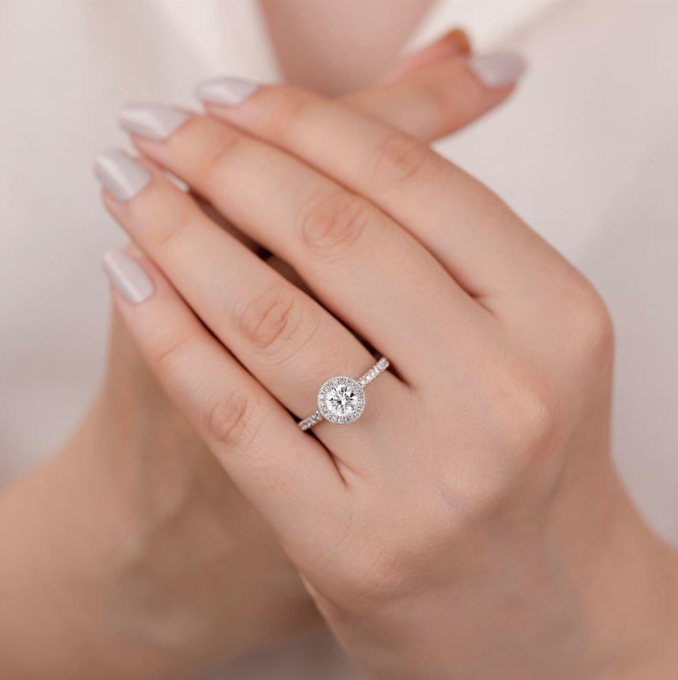 0.72 ct Round Cut Diamond Solitaire, Diamond Solitaire Ring with Edge Stone 
IGI Certified Diamond Wedding Ring,Solitaire Ring

This ring was made with quality materials and excellent handwork. I guarantee the quality assurance of my handwork and