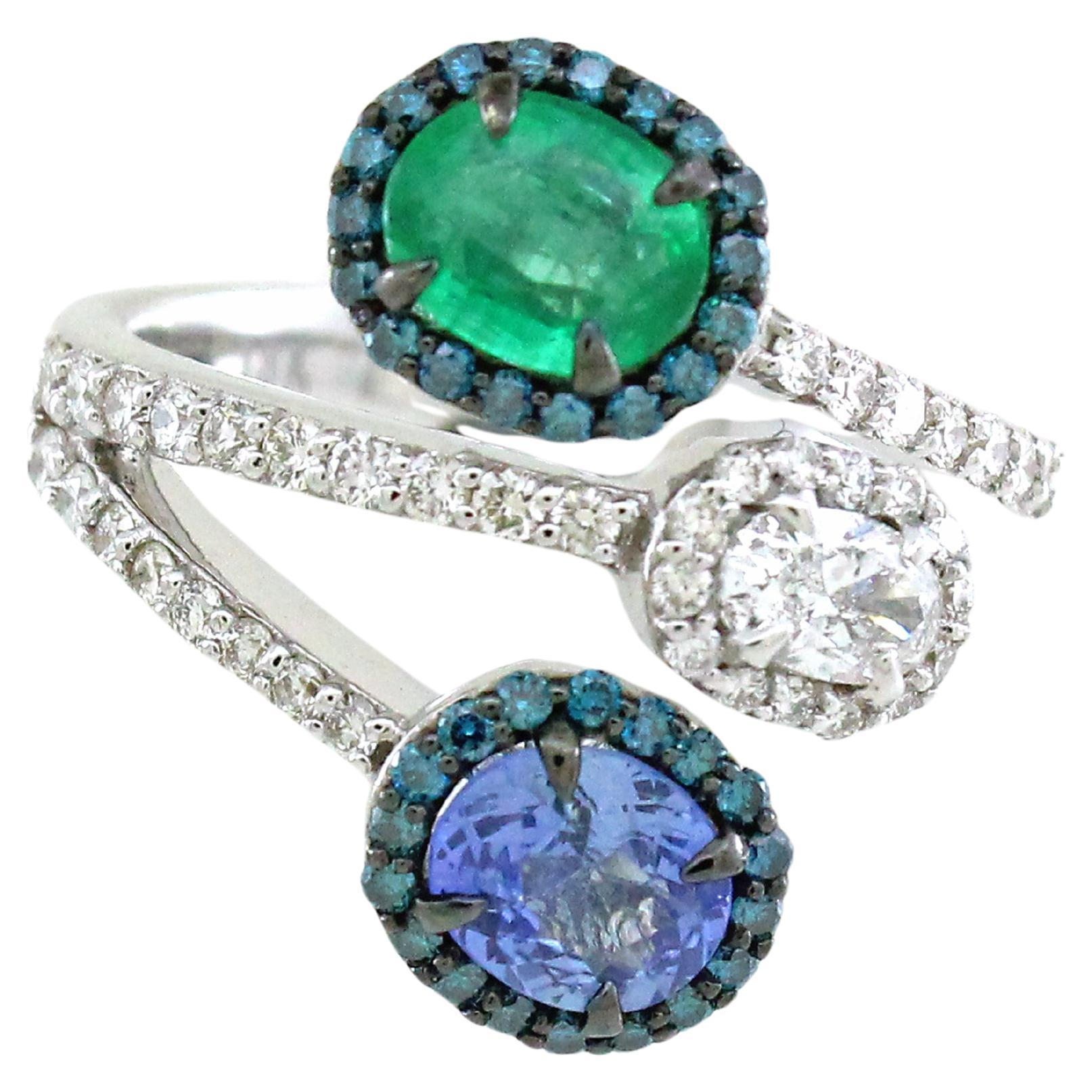 0.72 Cts Emerald and 0.66 Cts Tanzanite Ring For Sale