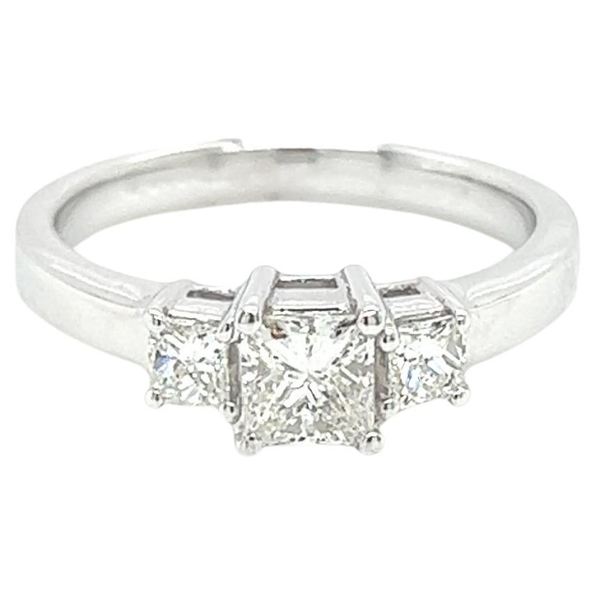 0.72 Carat Three Stone Princess Cut Ring For Sale