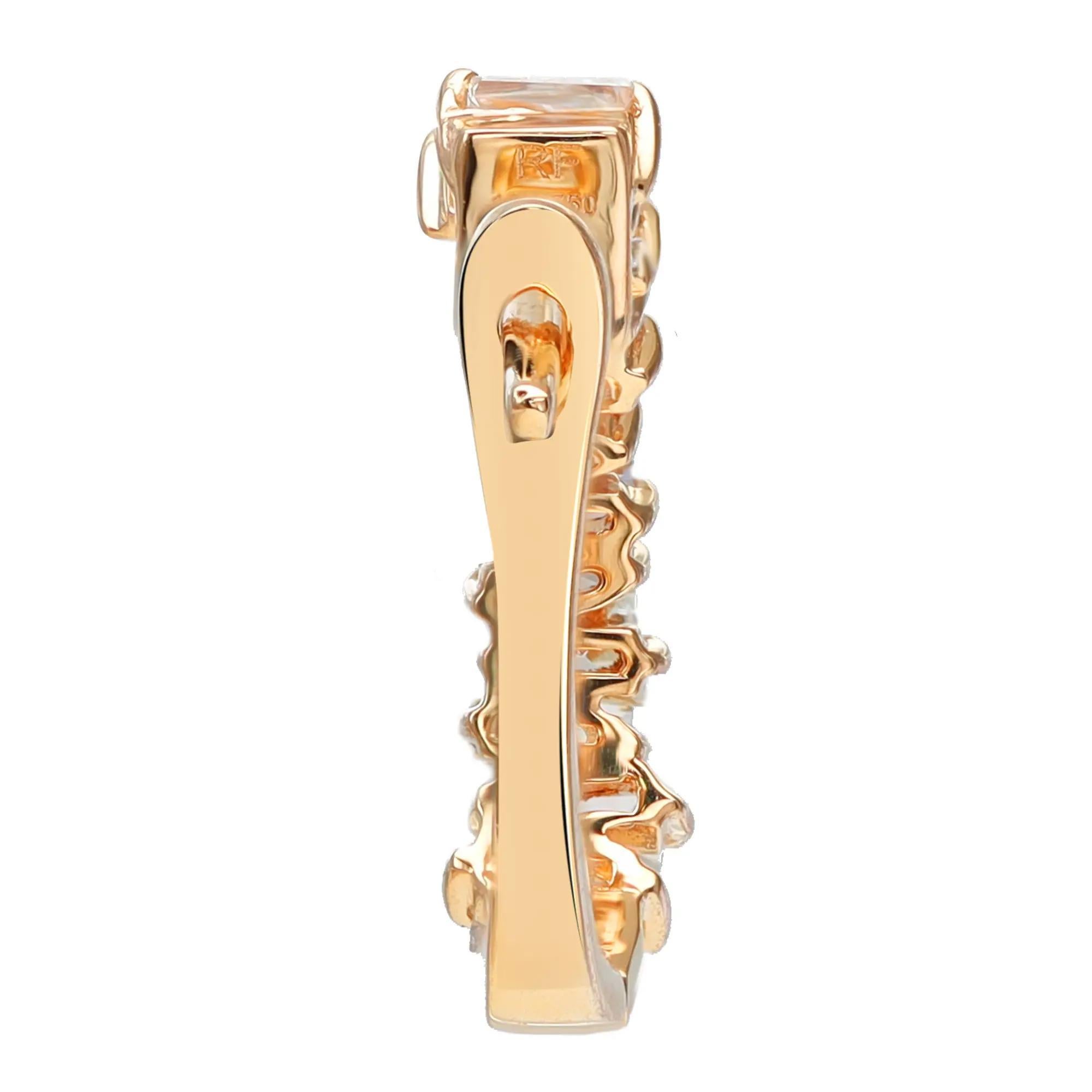 Sparkle all way with these beautiful diamond huggie earrings. Crafted in fine 18K yellow gold. These earrings feature prong set tapered baguette diamonds encrusted halfway through the earring. Total diamond weight: 0.72 carat. Diamond color G-H and