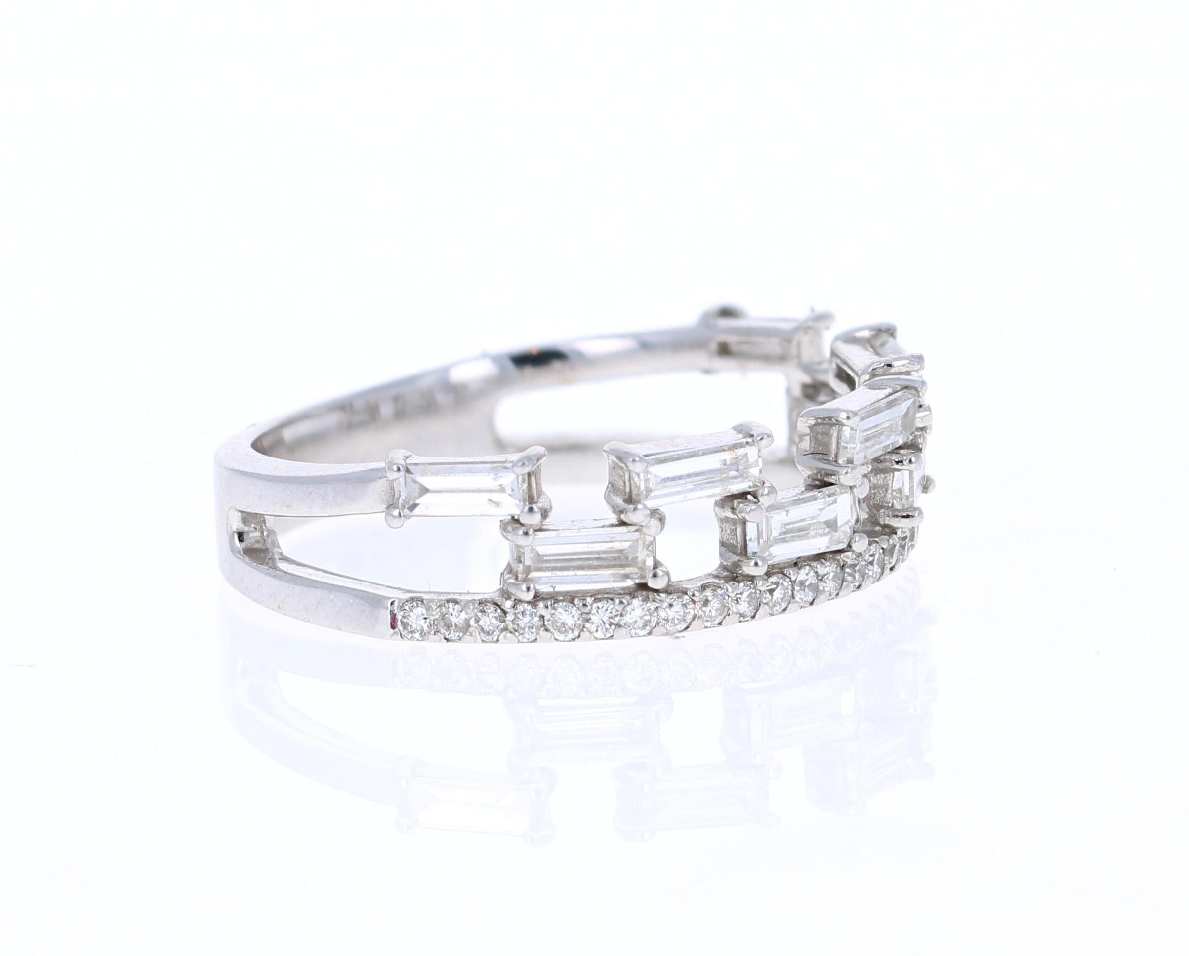 Baguette Cut Diamond White Gold Band

Unique and cute band that can be worn as a single band or stack with other bands in other colors of Gold! 

This ring has 9 Baguette Cut Diamonds that weigh 0.57 Carats and is embellished with 29 Round Cut
