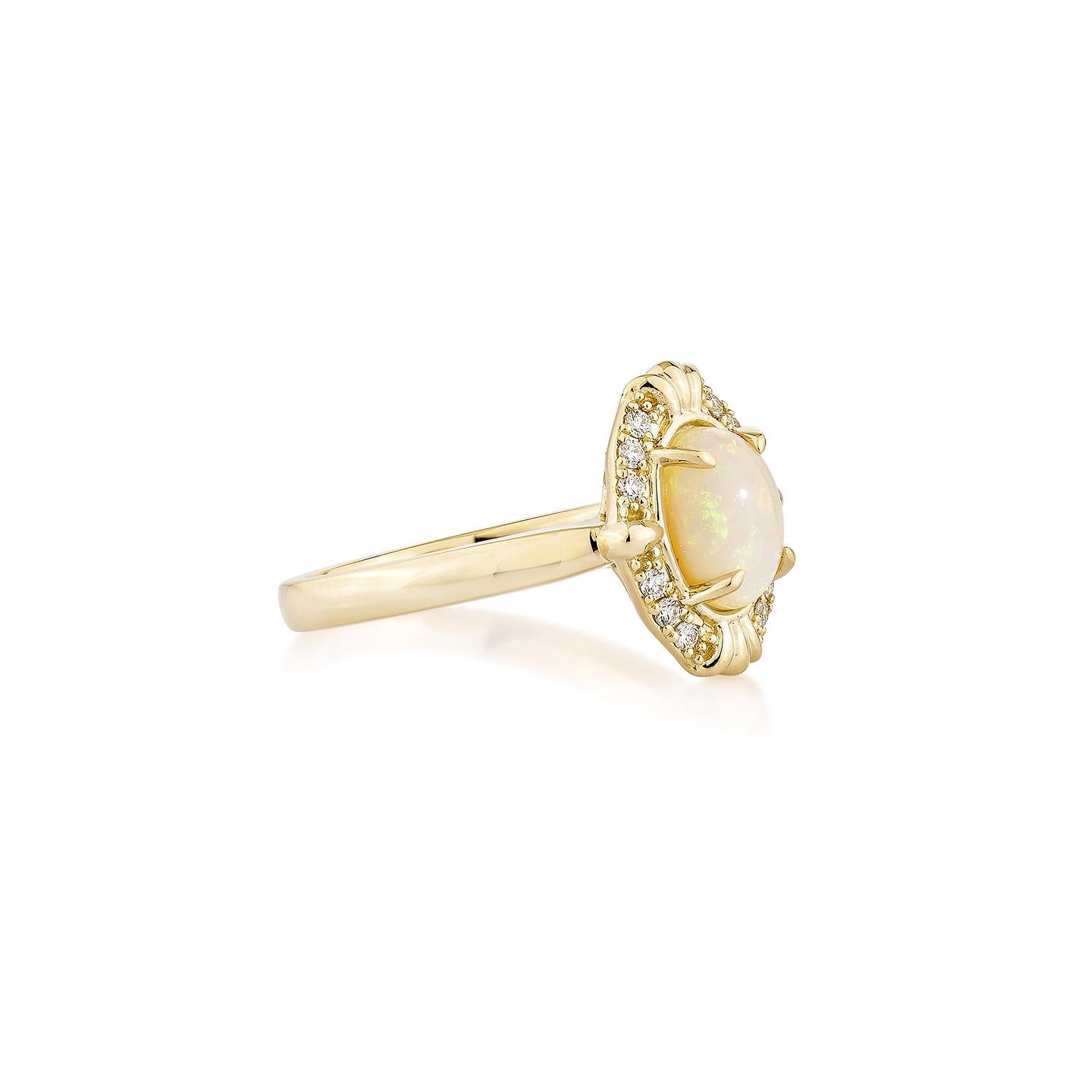Sunita Nahata presents a stunning Ethiopian opal cabochon ring, adorned with white diamonds. This gemstone, renowned for its historical significance, is believed to bring good luck, protection, and divine hope. Its metaphysical benefits include