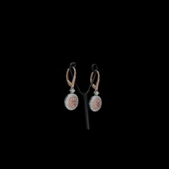 Pendientes de diamante Fancy Orangy Pink Diamond de 0,73 quilates con certificado GIA