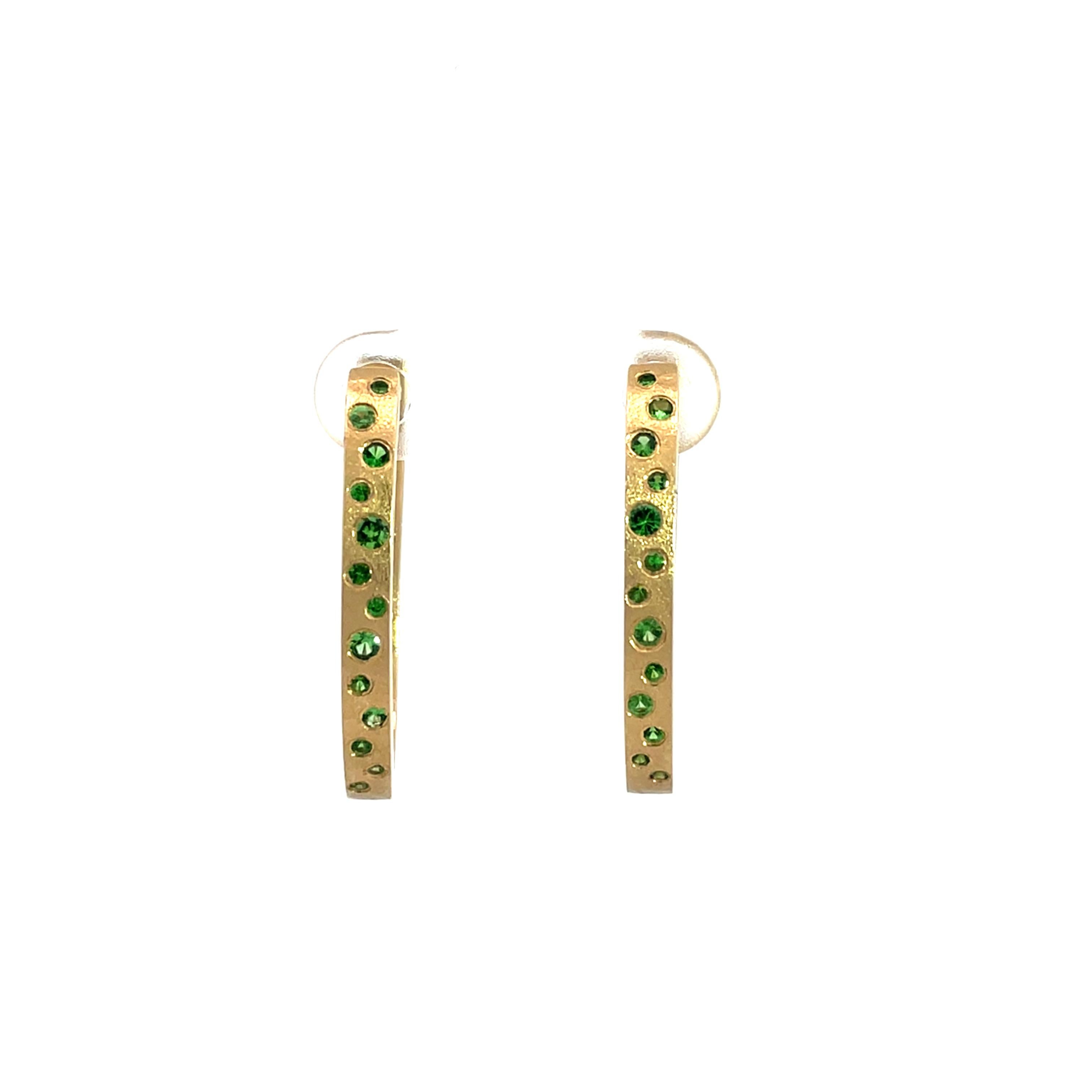0.73 Carat Green Tsavorite Flush Set Oval Hoop Yellow Gold Earrings In New Condition For Sale In Great Neck, NY