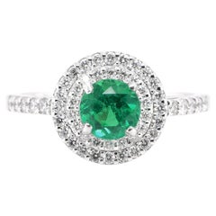  0.73 Carat Natural Diamond-Cut Emerald and Diamond Ring set in Platinum