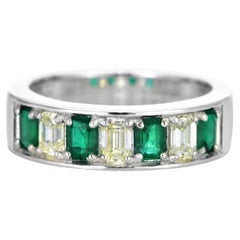 0.73 Carat Natural Emerald and Diamond Half Eternity Ring Made in Platinum