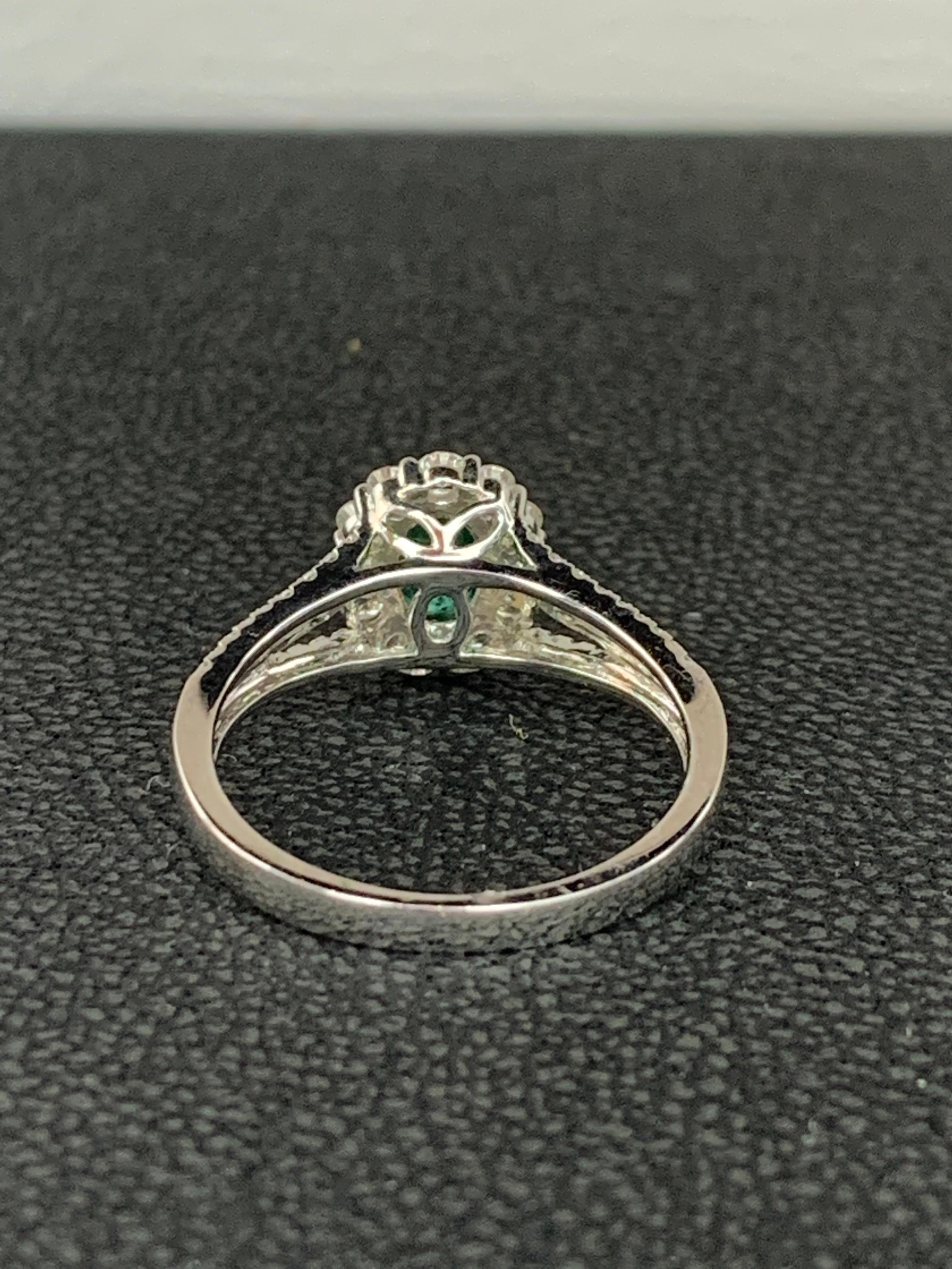 0.73 Carat Oval Cut Emerald and Diamond Fashion Ring in 18K White Gold In New Condition For Sale In NEW YORK, NY