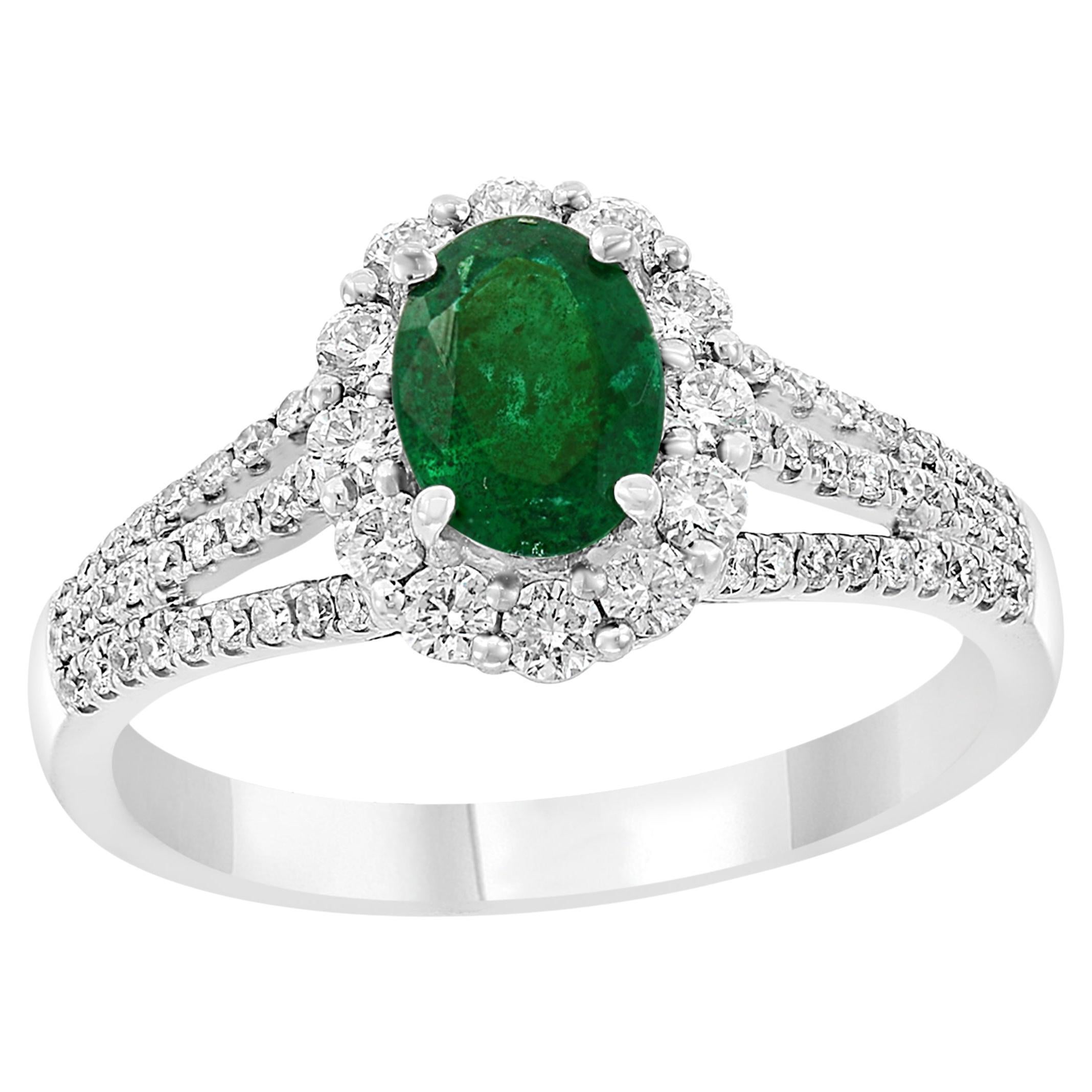 0.73 Carat Oval Cut Emerald and Diamond Fashion Ring in 18K White Gold For Sale