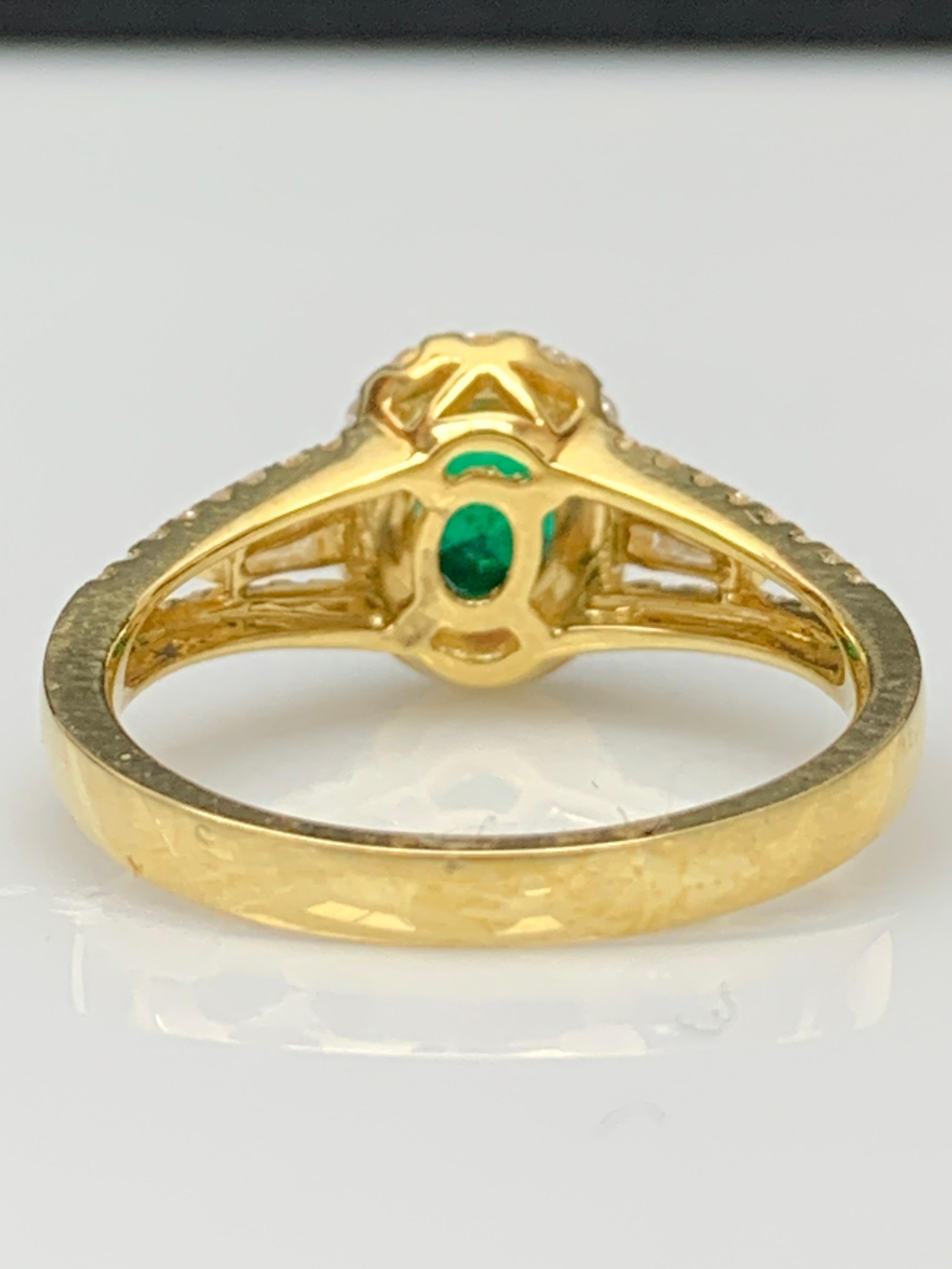 0.73 Carat Oval Cut Emerald and Diamond Ring in 18k Yellow Gold For Sale 8
