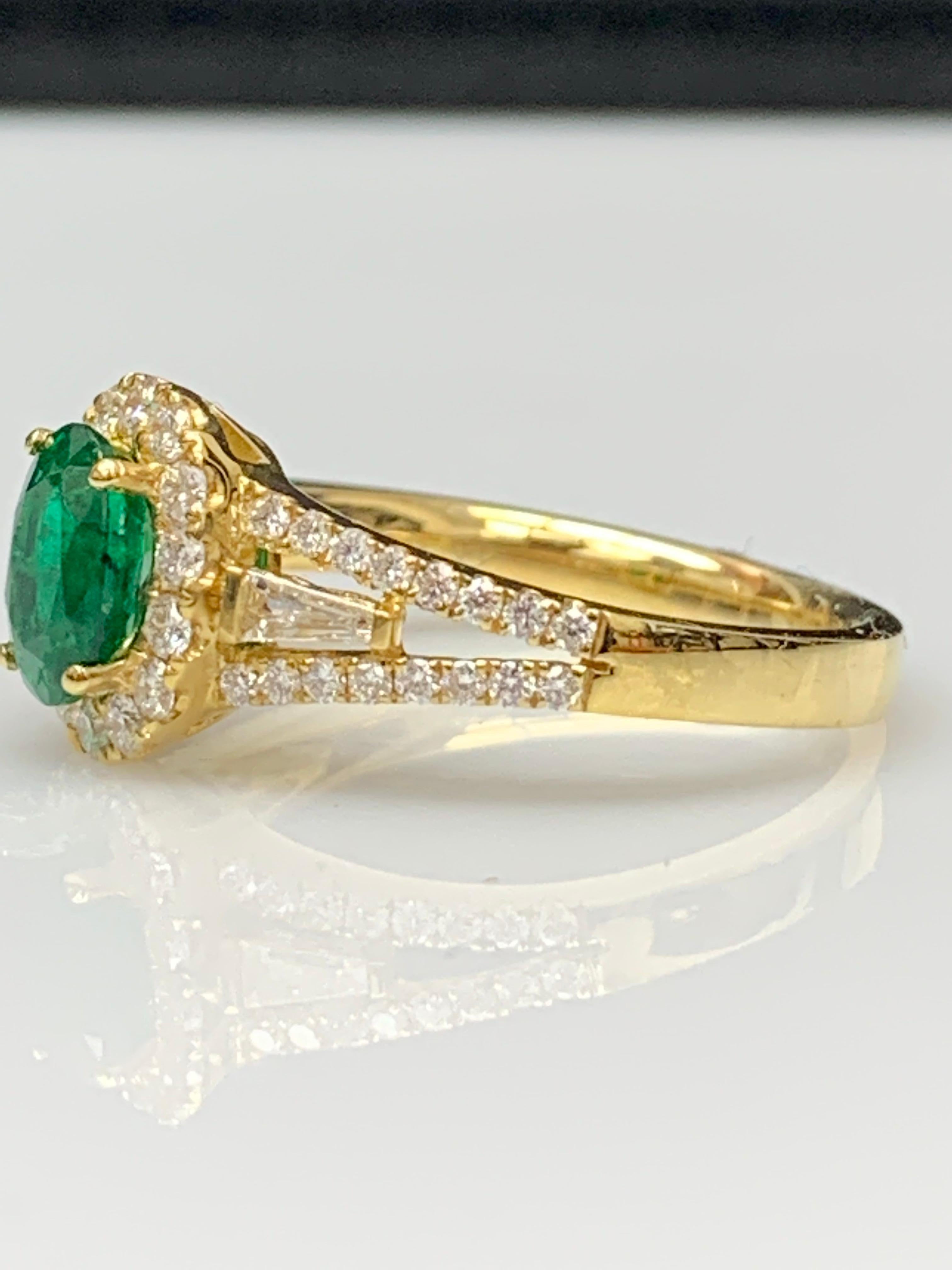 0.73 Carat Oval Cut Emerald and Diamond Ring in 18k Yellow Gold For Sale 9