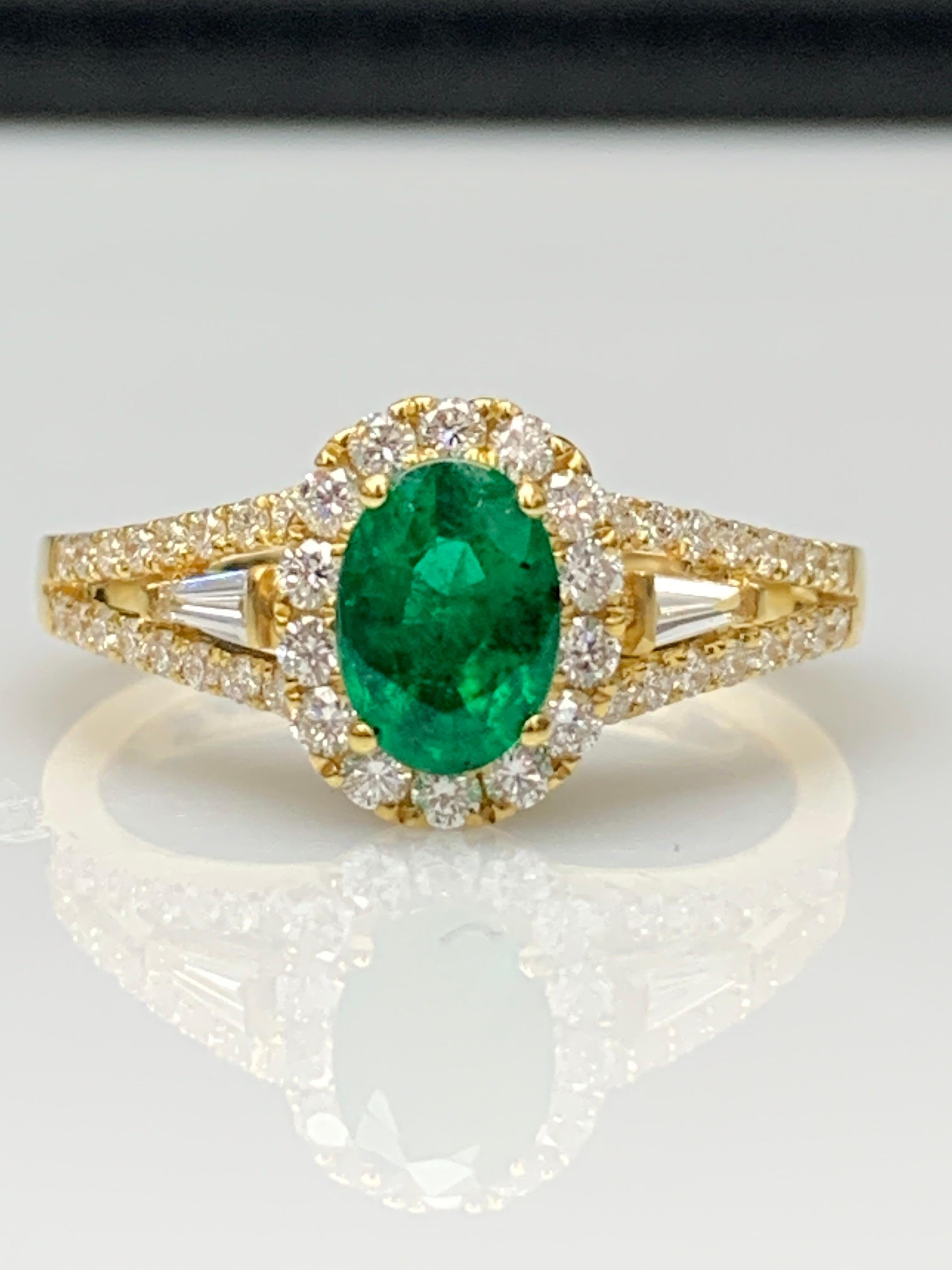0.73 Carat Oval Cut Emerald and Diamond Ring in 18k Yellow Gold For Sale 10