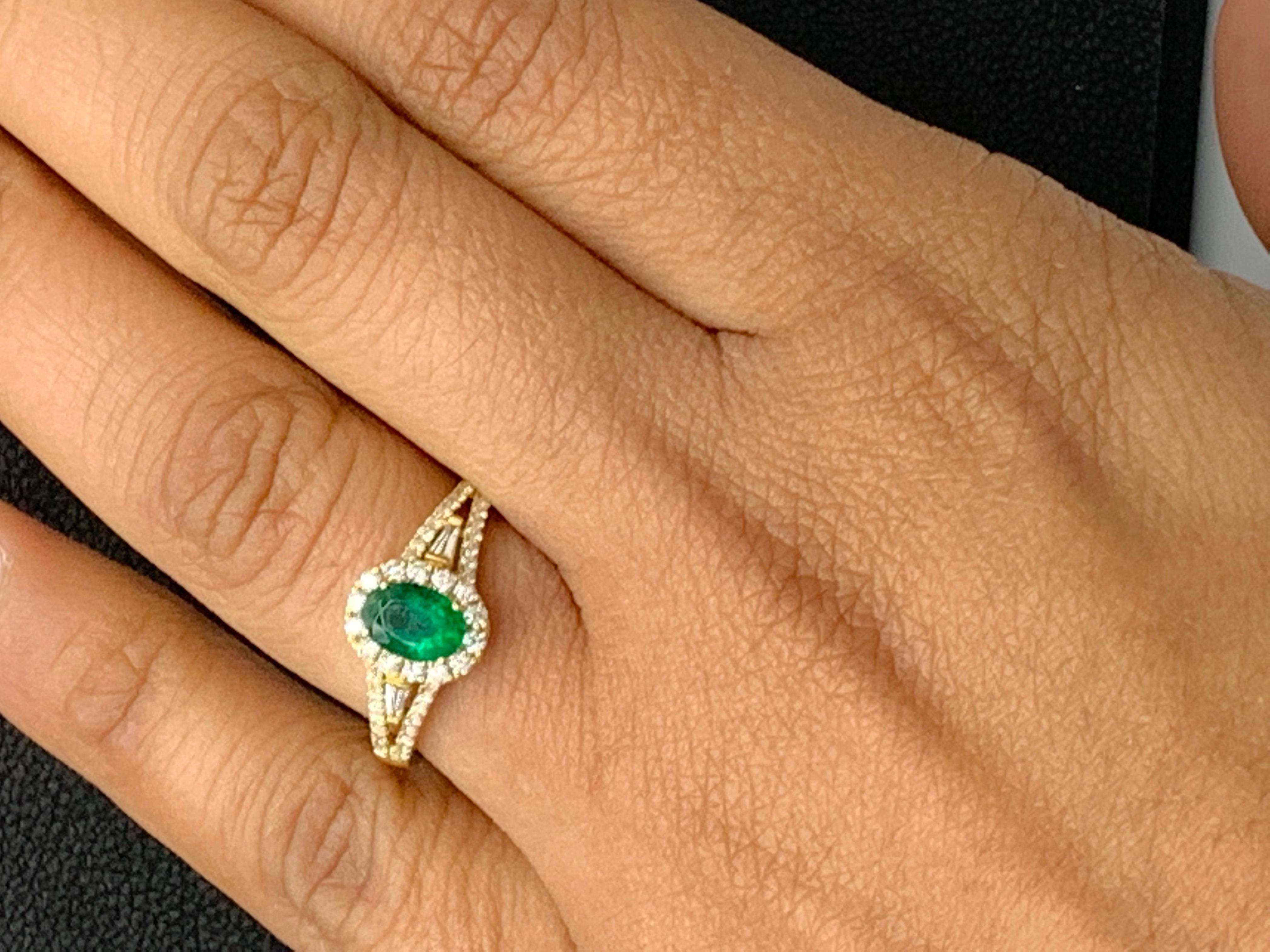 0.73 Carat Oval Cut Emerald and Diamond Ring in 18k Yellow Gold For Sale 13