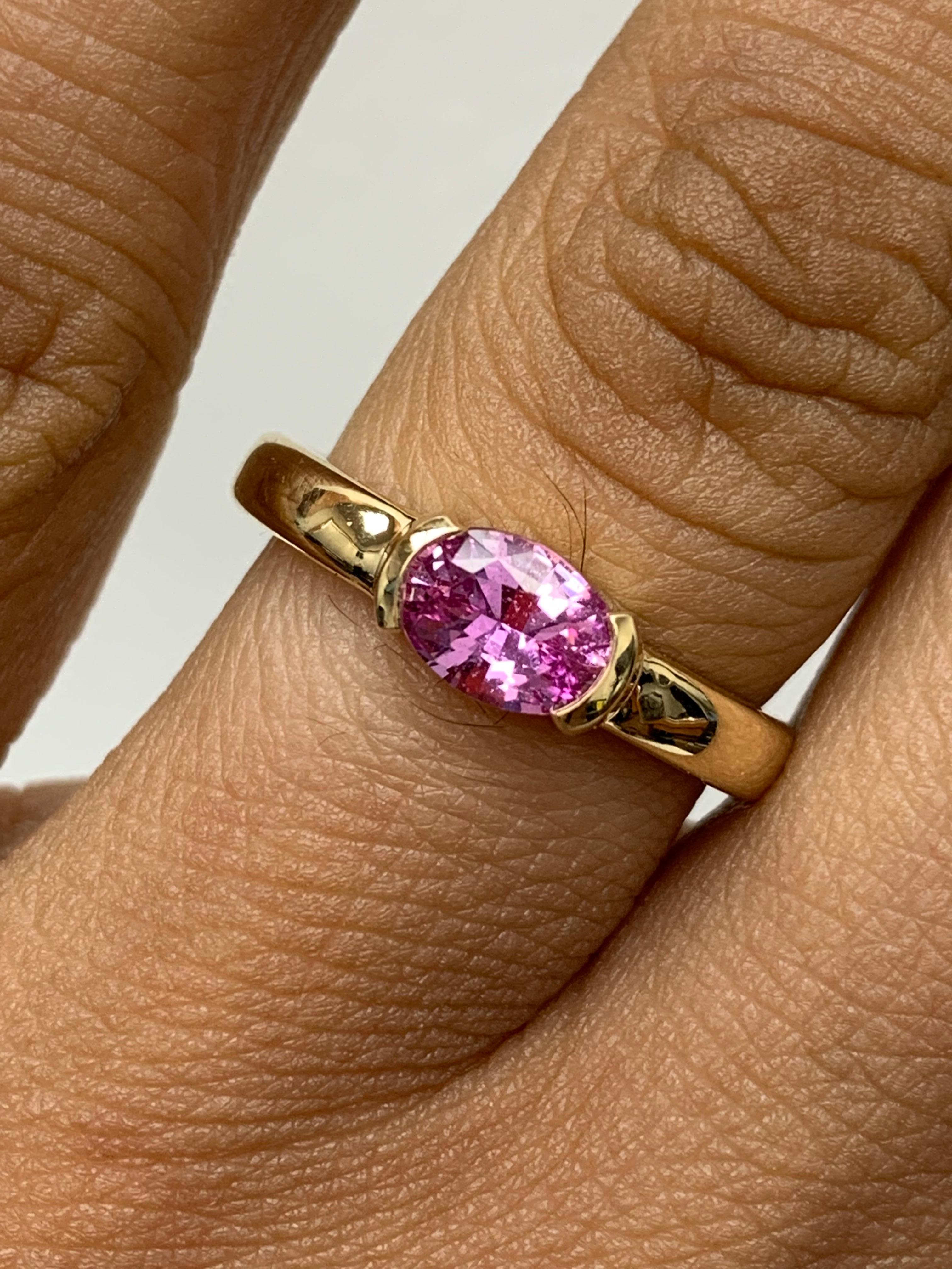 0.73 Carat Oval Cut Pink Sapphire Band Ring in 14K Yellow Gold For Sale 5