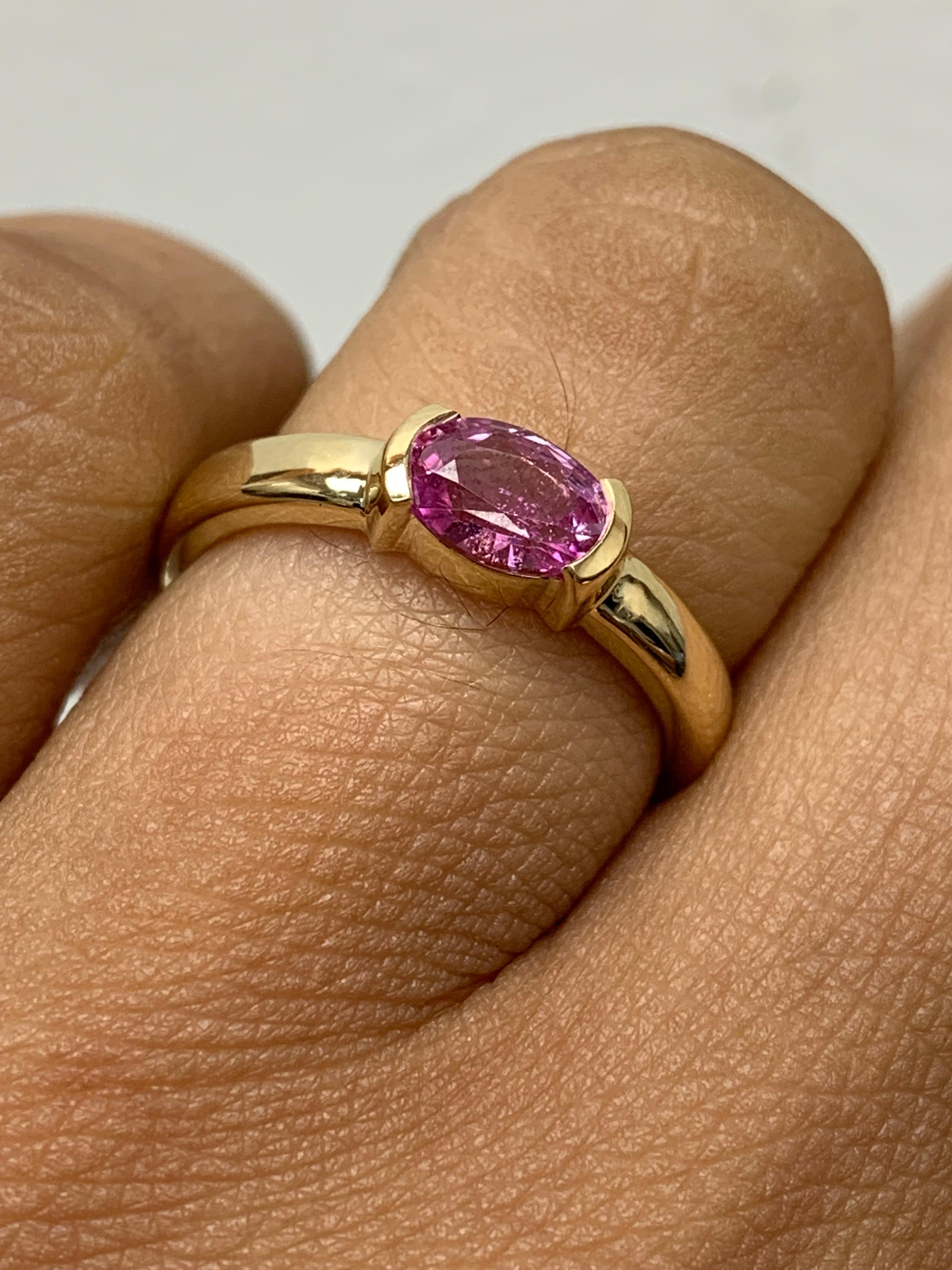 0.73 Carat Oval Cut Pink Sapphire Band Ring in 14K Yellow Gold For Sale 6