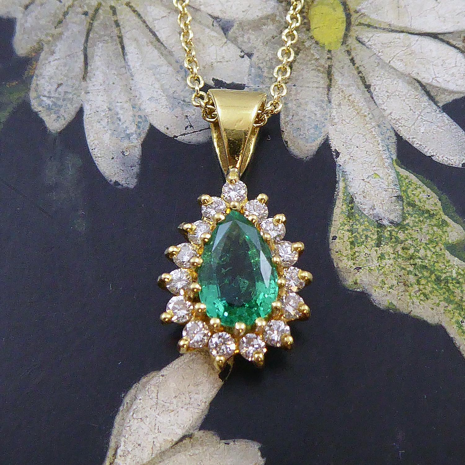 Modern 0.73 Carat Pear-Shaped Emerald Pendant in Diamond Surround, Yellow Gold 