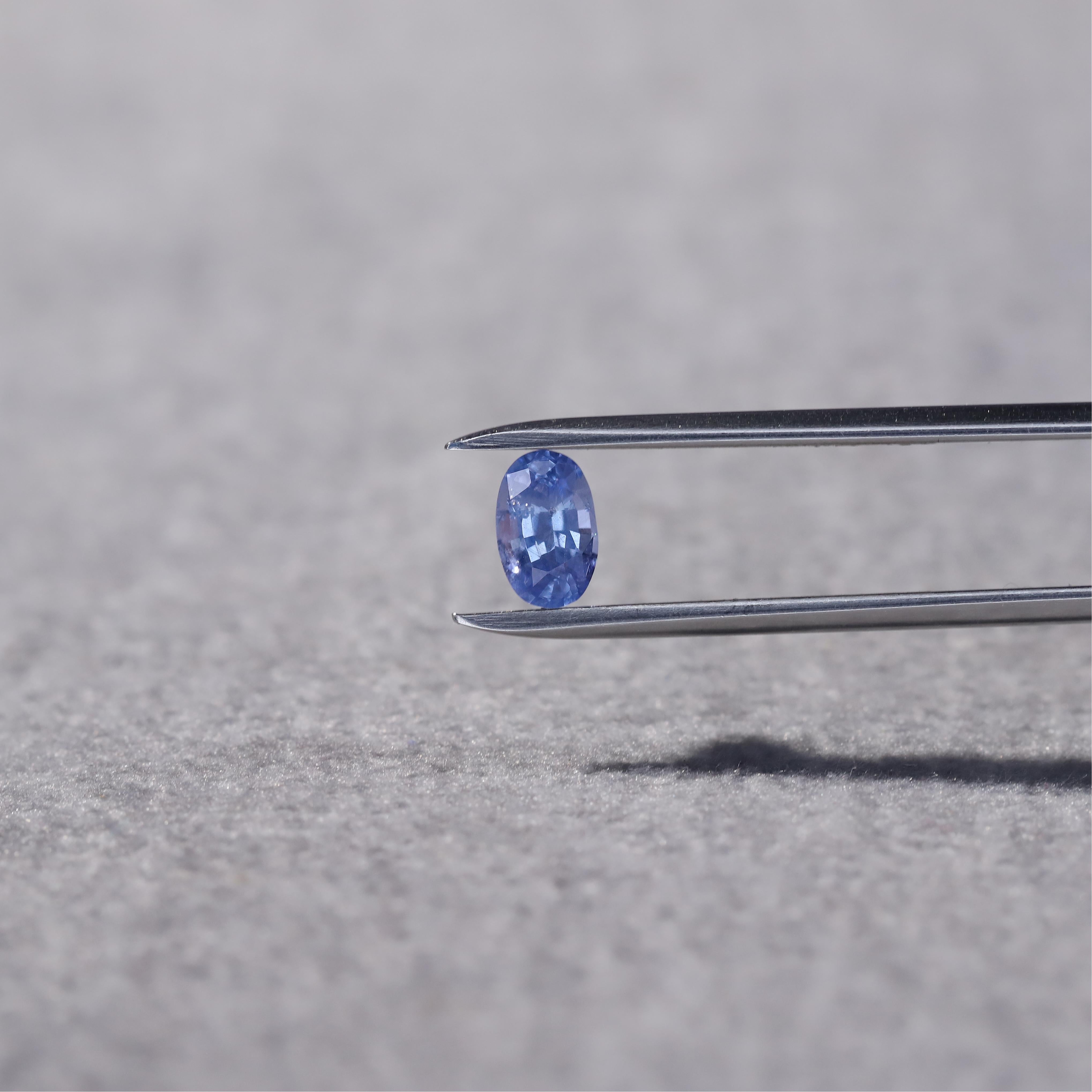 A petite oval-shaped natural unheated sapphire in sky blue with a dash of baby blue hues. 

Natural Unheated Blue Sapphire sourced from Ceylon 0.73 Carat.

This magnificent blue sapphire by KNS Gems is available for purchase as a loose gemstone. The