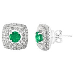 0.73 Carat Round Cut Emerald and Diamond Stud Earrings in 18K White Gold