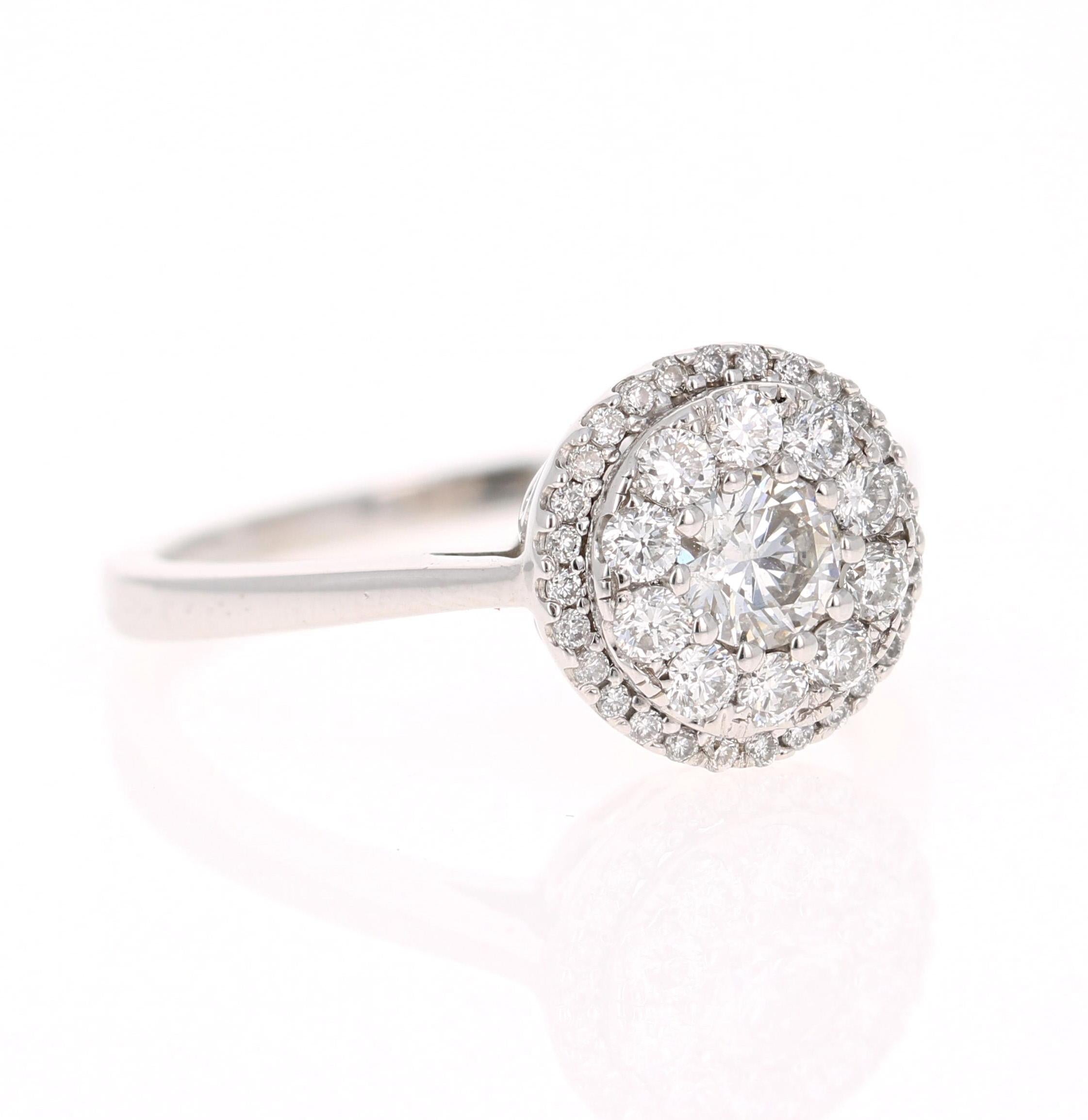 A beautiful round cut diamond ring set in a round invisible setting creating a larger look! 

This ring has 39 Round Cut Diamonds that weigh 0.73 Carats. (Clarity: VS, Color: F)

It is set in 14K White Gold and has an approximate weight of 3.2