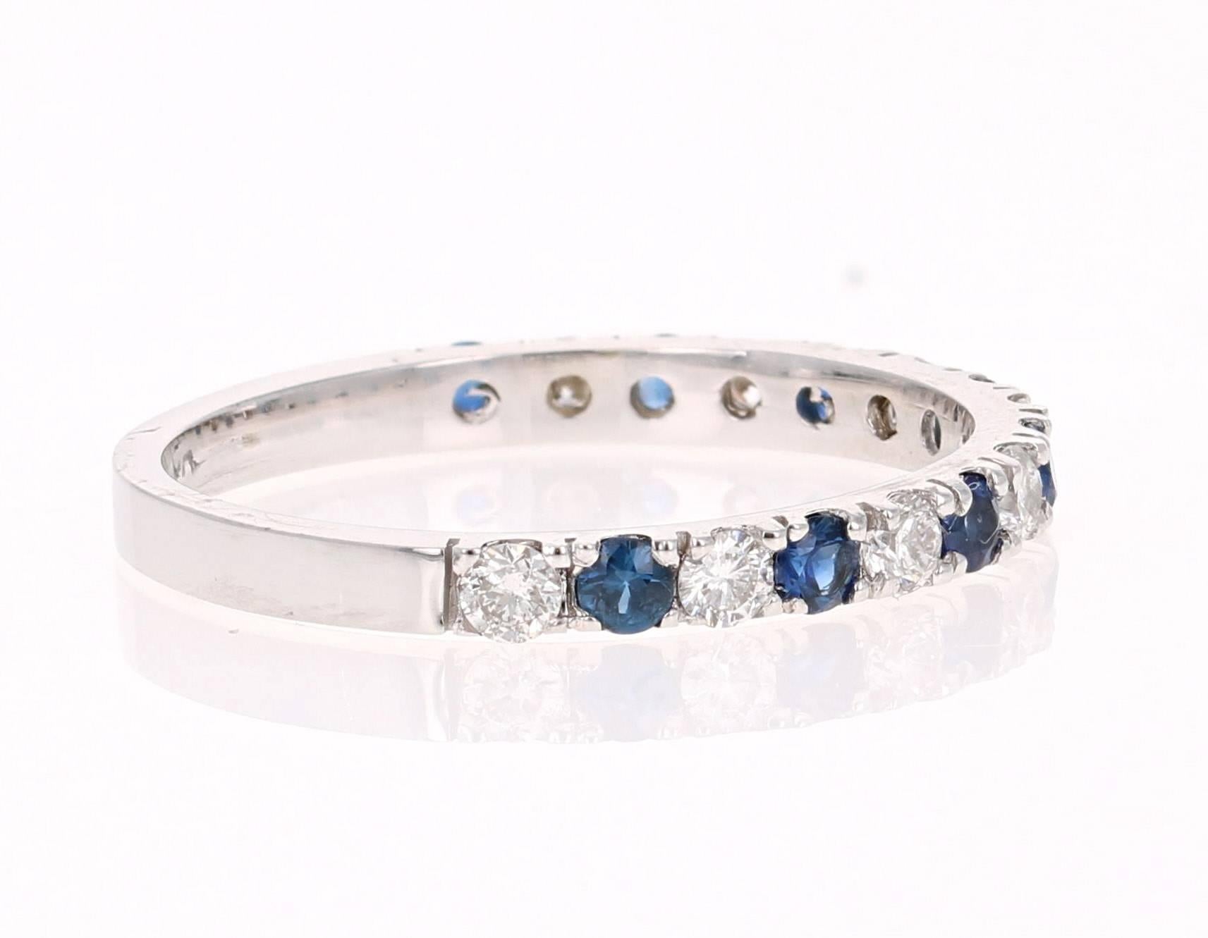 Cute and dainty Sapphire and Diamond band that is sure to be a great addition to anyone's accessory collection.   There are 8 Round Cut Sapphires that weigh 0.41 carats and 8 Round Cut Diamonds that weigh 0.32 carats (Clarity:  SI2, Color: F).  The