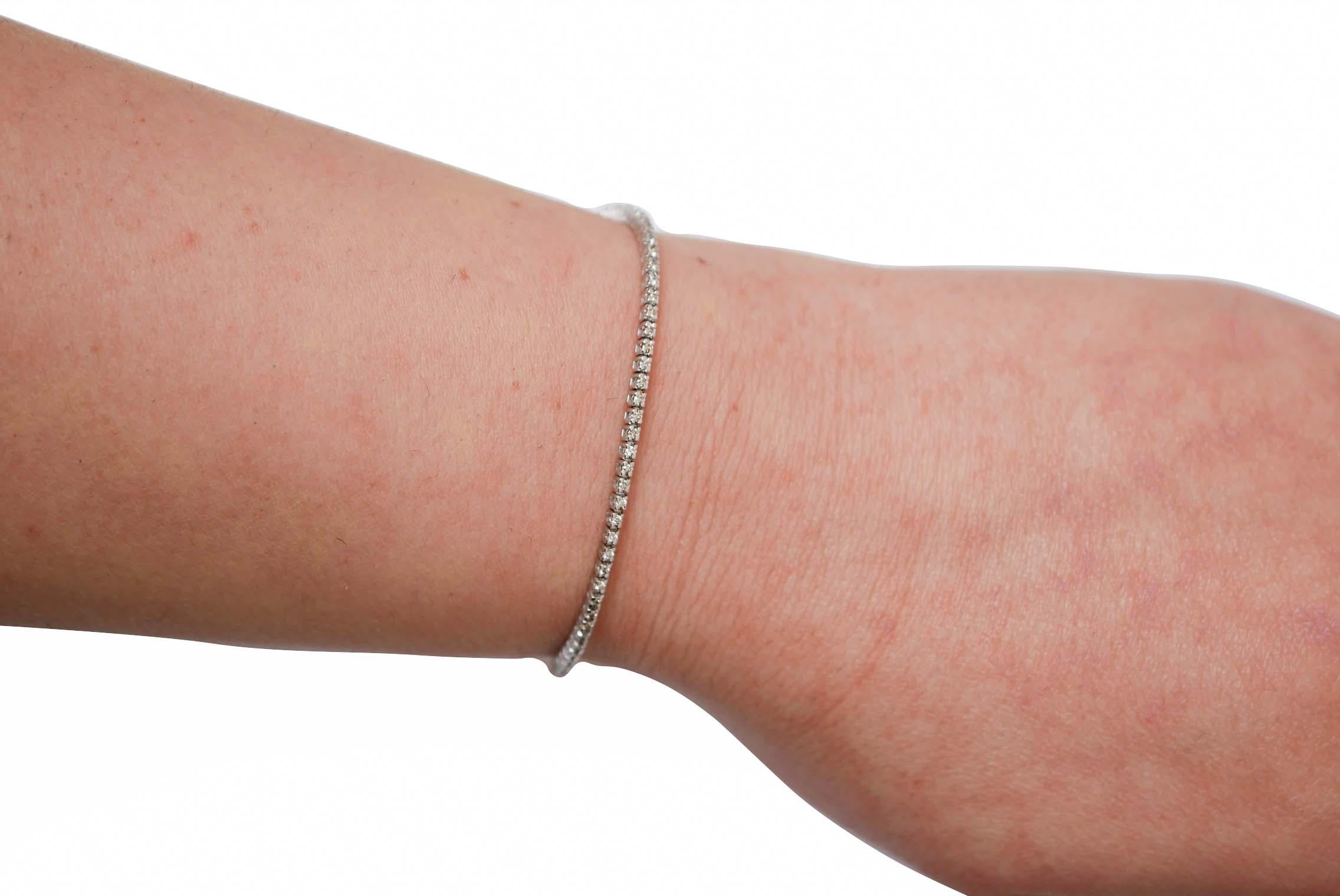 Brilliant Cut 0.73 Carats Diamonds, 14 Karat White Gold Tennis Bracelet. For Sale