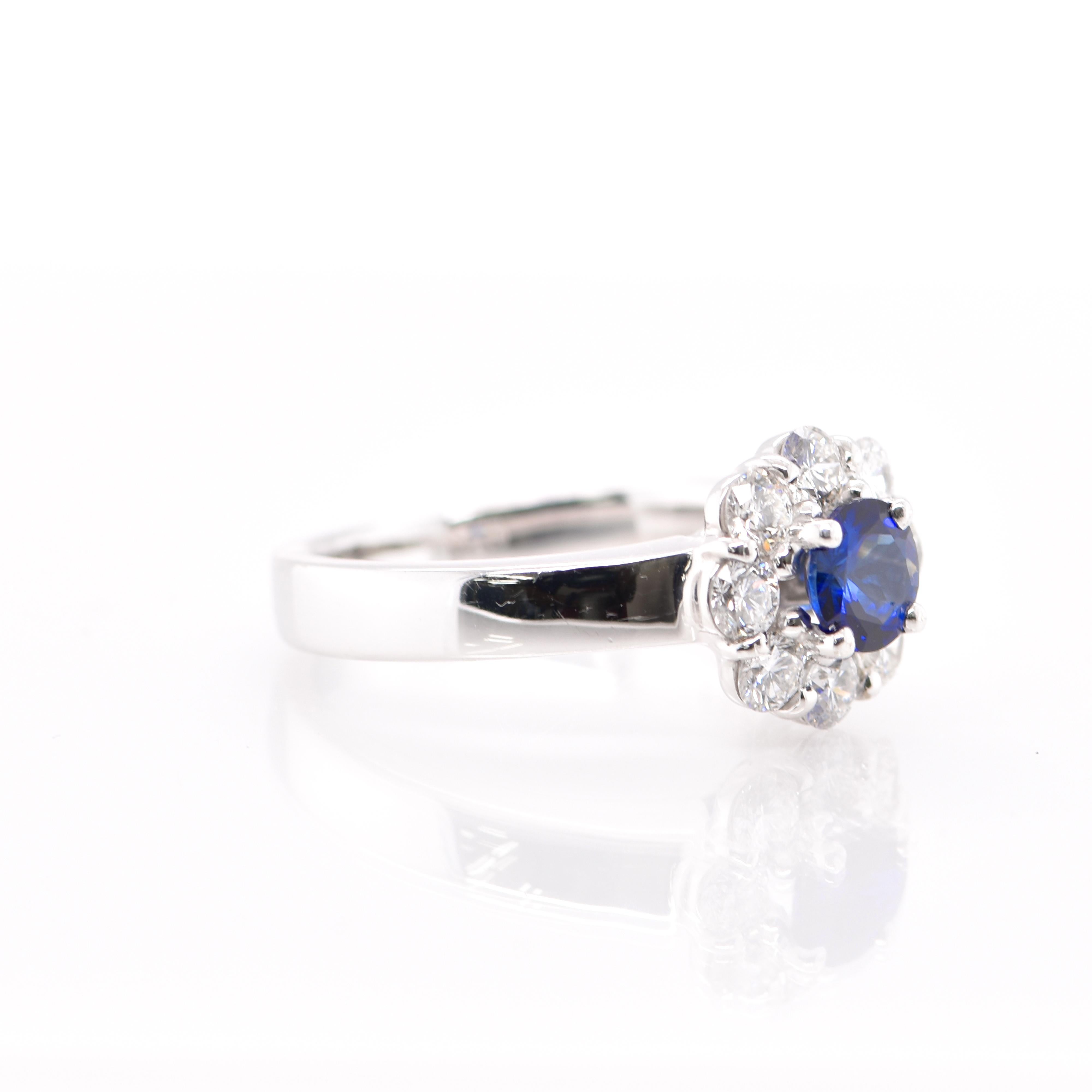Modern 0.73 Carat Sapphire and Diamond Engagement Ring Set in 18 Karat White Gold For Sale