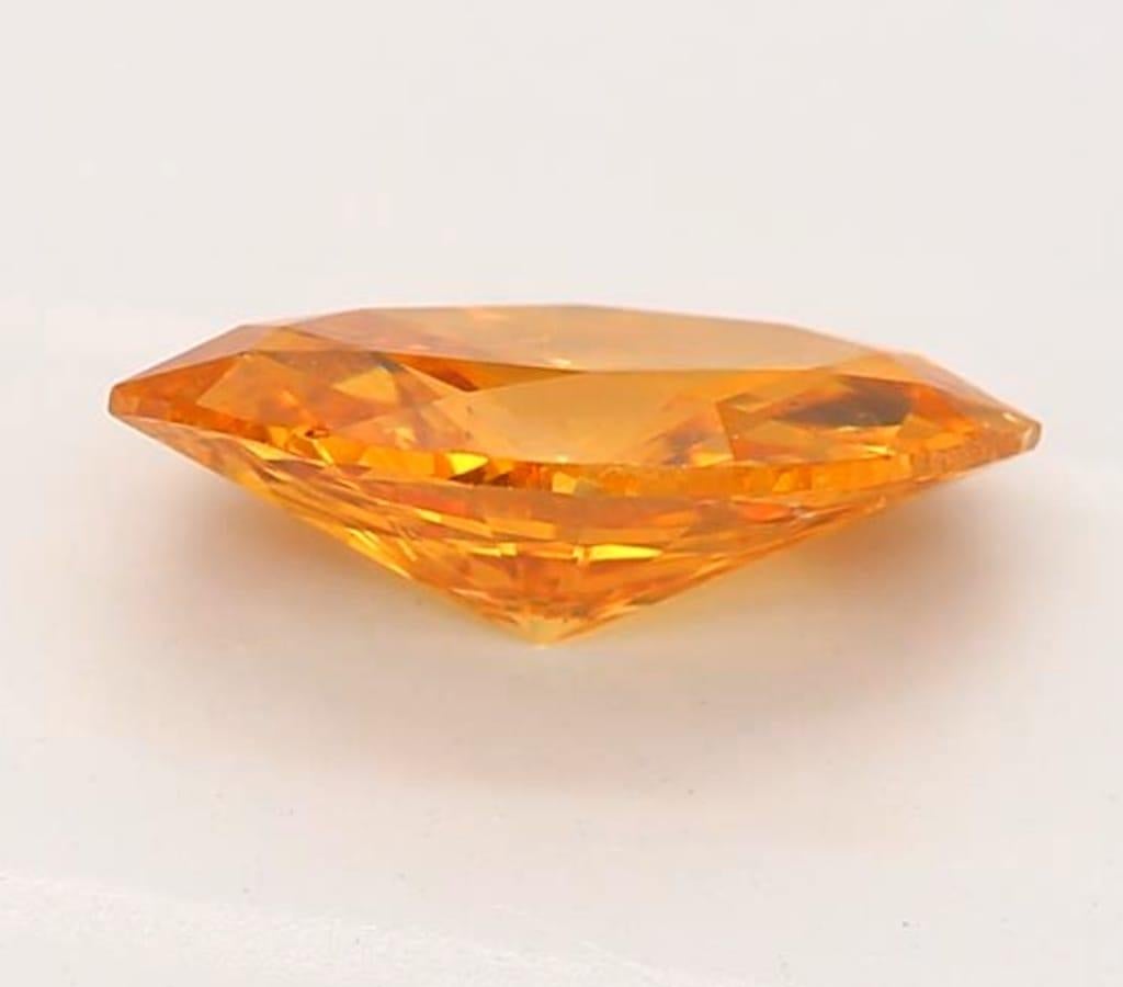 0,73 Karat Ausgefallener tiefgelber orangefarbener Diamant im Marquise-Schliff I1 Reinheit GIA zertifiziert (Marquiseschliff) im Angebot