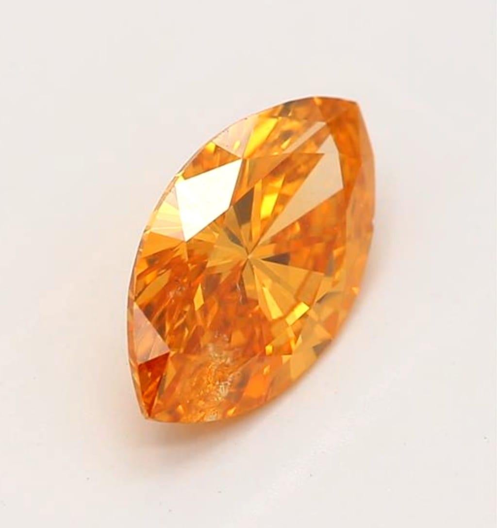 Women's or Men's 0.73Carat Fancy Deep Yellow Orange Marquise Cut Diamond I1 Clarity GIA Certified For Sale