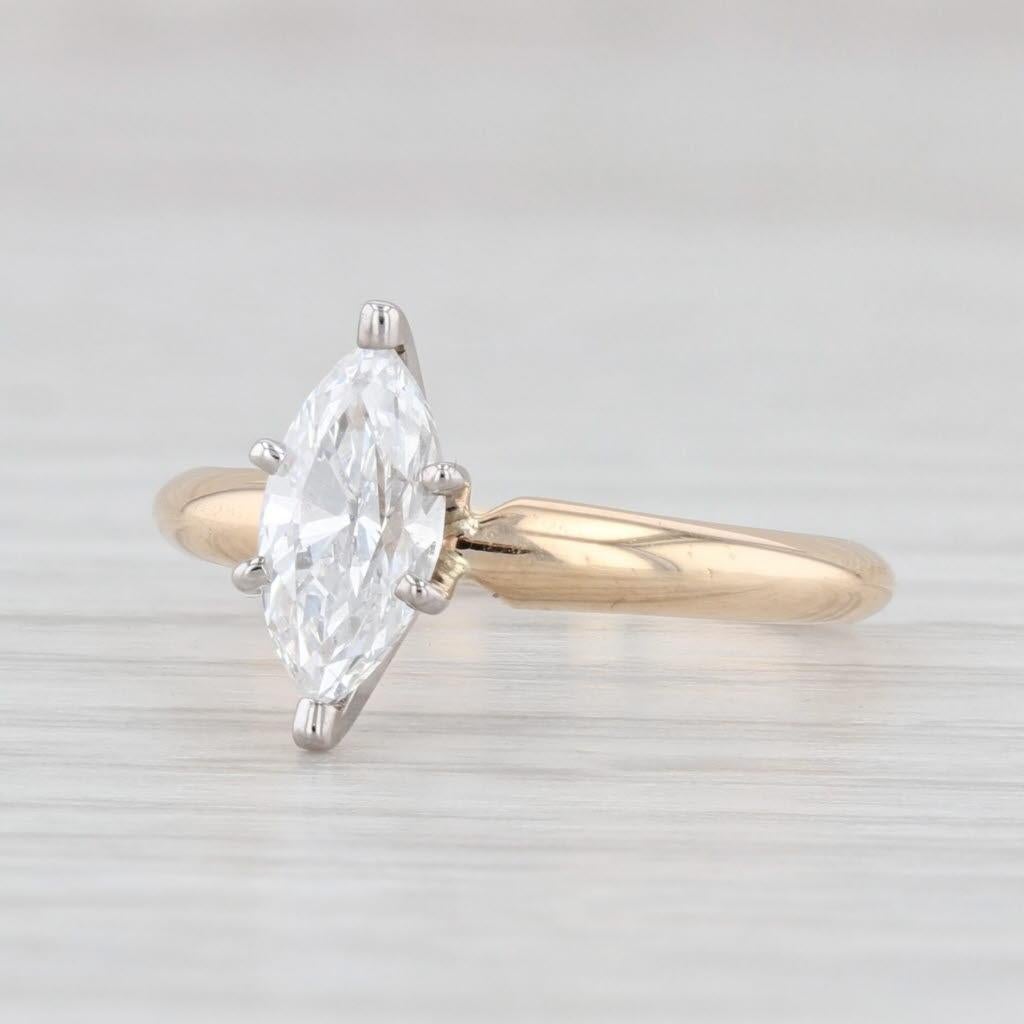 Gemstone Information:
- Natural Diamond -
Carats - 0.73ct 
Cut - Marquise Brilliant
Color - F - G
Clarity - VS2

Metal: 14k Yellow Gold, White Gold Prongs 
Weight: 2.2 Grams 
Stamps: 14k
Face Height: 10.5 mm 
Rise Above Finger: 5.9 mm
Band / Shank