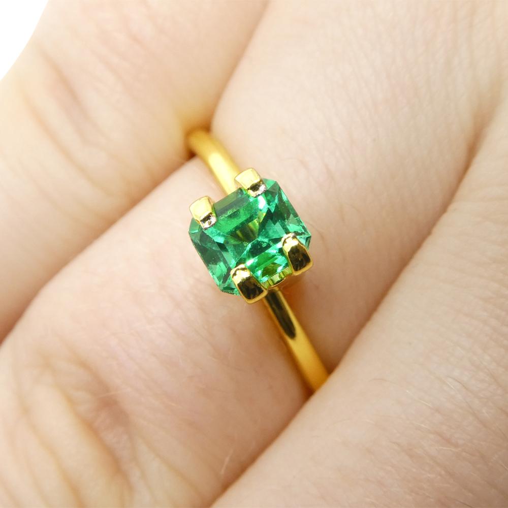 Description:

Gem Type: Emerald 
Number of Stones: 1
Weight: 0.73 cts
Measurements: 5.53 x 4.94 x 4.06 mm
Shape: Rectangular/Emerald Cut
Cutting Style Crown: Emerald Cut
Cutting Style Pavilion: Step Cut 
Transparency: Transparent
Clarity: Very Very