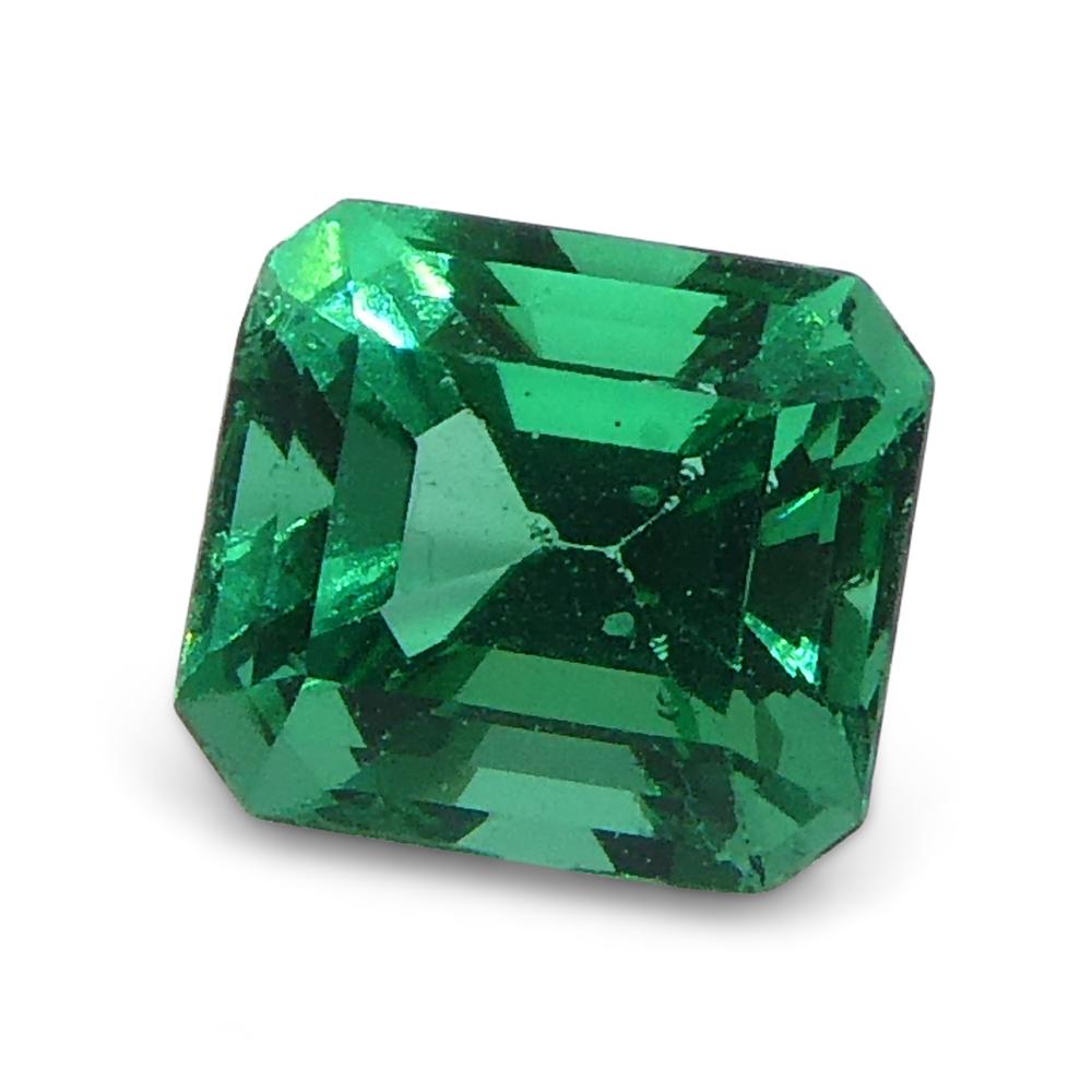 Women's or Men's 0.73ct Rectangular/Emerald Cut Green Emerald from Colombia For Sale