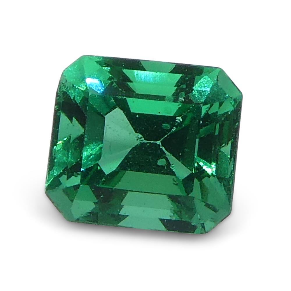0.73ct Rectangular/Emerald Cut Green Emerald from Colombia For Sale 2