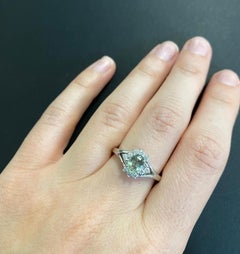 0.74 Carat Natural Alexandrite and Diamond Ring